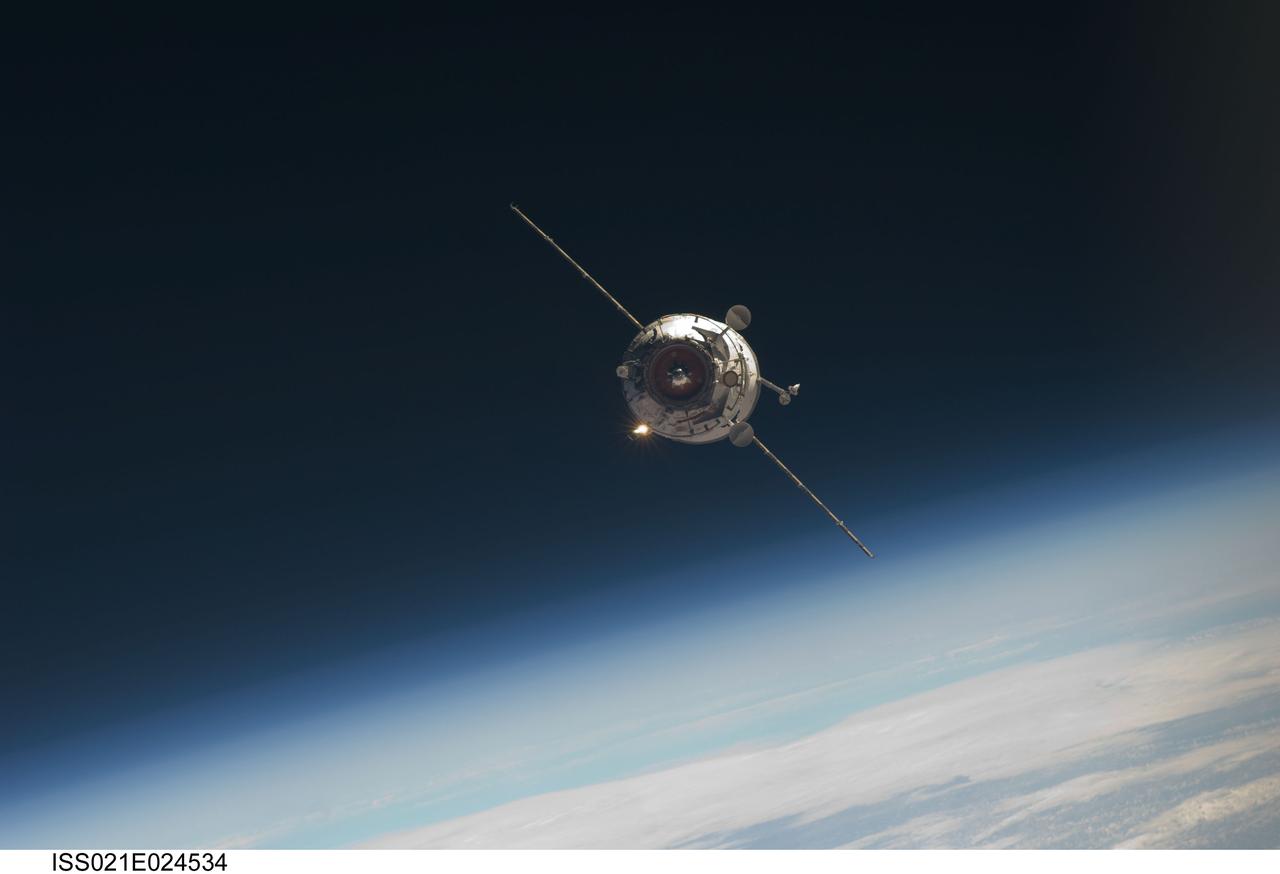 ISS021-E-024534 (12 Nov. 2009) --- Backdropped by Earth’s horizon and the blackness of space, the new unpiloted Russian Mini-Research Module 2 (MRM2), also known as Poisk, approaches the International Space Station. The MRM2 docked to the space-facing port of the Zvezda Service Module at 9:41 a.m. (CST) on Nov. 12, 2009. It began its trip to the station when it was launched aboard a Soyuz rocket from the Baikonur Cosmodrome in Kazakhstan on Nov. 10. Poisk is a Russian term that translates to search, seek and explore. It will provide an additional docking port for visiting Russian spacecrafts and will serve as an extra airlock for spacewalkers wearing Russian Orlan spacesuits. Poisk joins a Russian Progress resupply vehicle and two Russian Soyuz spacecraft currently docked at the station.