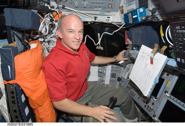 NASA image: Expedition 21 FE Williams poses for a photo on the Atlantis Flight Deck