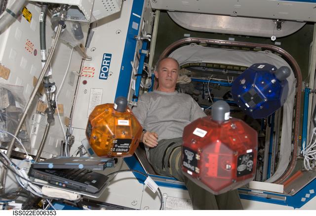 NASA image: Williams works with SPHERES in the U.S. Laboratory during Expedition 22