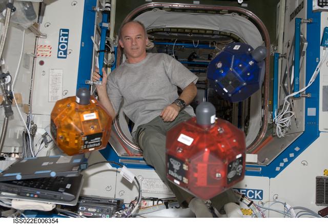 NASA image: Williams works with SPHERES in the U.S. Laboratory during Expedition 22