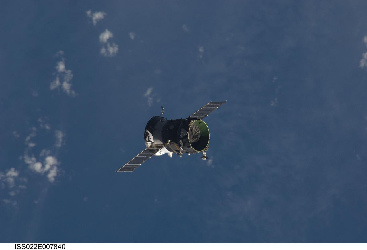 ISS022-E-007840 (7 Dec. 2009) --- The propulsion compartment of the Poisk Mini-Research Module 2 (MRM2) departs from the International Space Station and was deorbited four hours later for a destructive reentry in Earth?s atmosphere. The undocking occurred at 6:16 p.m. (CST) on Dec. 7, 2009. Its departure opens up a docking port for Russian vehicles on Poisk, which will first be used when NASA astronaut Jeffrey Williams, Expedition 22 commander; and Russian cosmonaut Maxim Suraev, flight engineer, relocate their Soyuz spacecraft in January 2010.