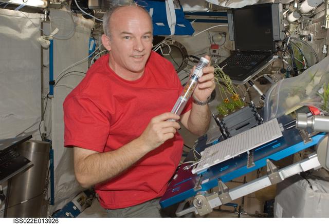 NASA image: Williams performs service on the APEX-Cambium in the JPM during Expedition 22