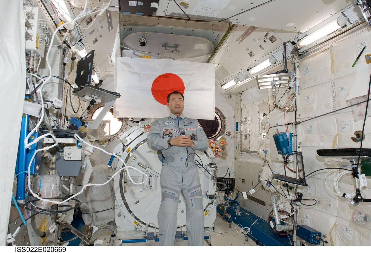 ISS022-E-020669 (7 Jan. 2010) --- Japan Aerospace Exploration Agency (JAXA) astronaut Soichi Noguchi, Expedition 22 flight engineer, participates in a JAXA event, involving Japanese Prime Minister Yukio Hatoyama and other officials, from the Kibo laboratory of the International Space Station.