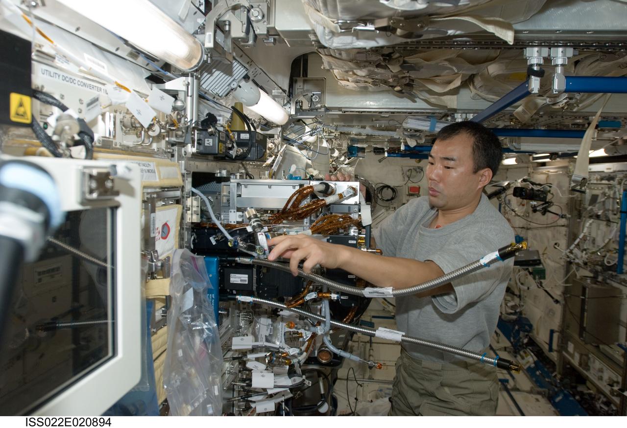 ISS022-E-020894 (11 Jan. 2010) --- Japan Aerospace Exploration Agency (JAXA) astronaut Soichi Noguchi, Expedition 22 flight engineer, works with Fluid Physics Experiment Facility/Marangoni Surface (FPEF MS) Core hardware in the Kibo laboratory of the International Space Station. The Marangoni convection experiment in the FPEF examines fluid tension flow in micro-G.
