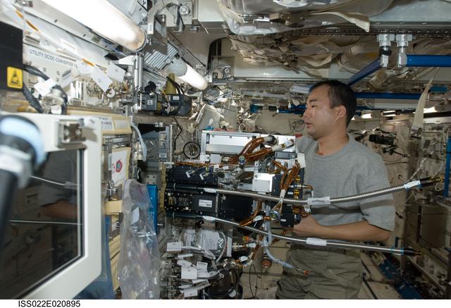 NASA image: Noguchi removes the FPEF MI in the JPM during Expedition 22