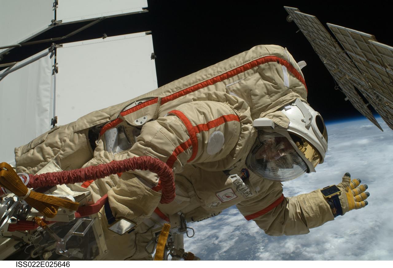 ISS022-E-025646 (14 Jan. 2010) --- Russian cosmonauts Oleg Kotov and Maxim Suraev (out of frame), both Expedition 22 flight engineers, participate in a session of extravehicular activity (EVA) as maintenance and construction continue on the International Space Station. During the spacewalk, Kotov and Suraev prepared the Mini-Research Module 2 (MRM2), known as Poisk, for future Russian vehicle dockings. Suraev and NASA astronaut Jeffrey Williams, commander, will be the first to use the new docking port when they relocate their Soyuz TMA-16 spacecraft from the aft port of the Zvezda Service Module on Jan. 21. Earth’s horizon and the blackness of space provide the backdrop for the scene.