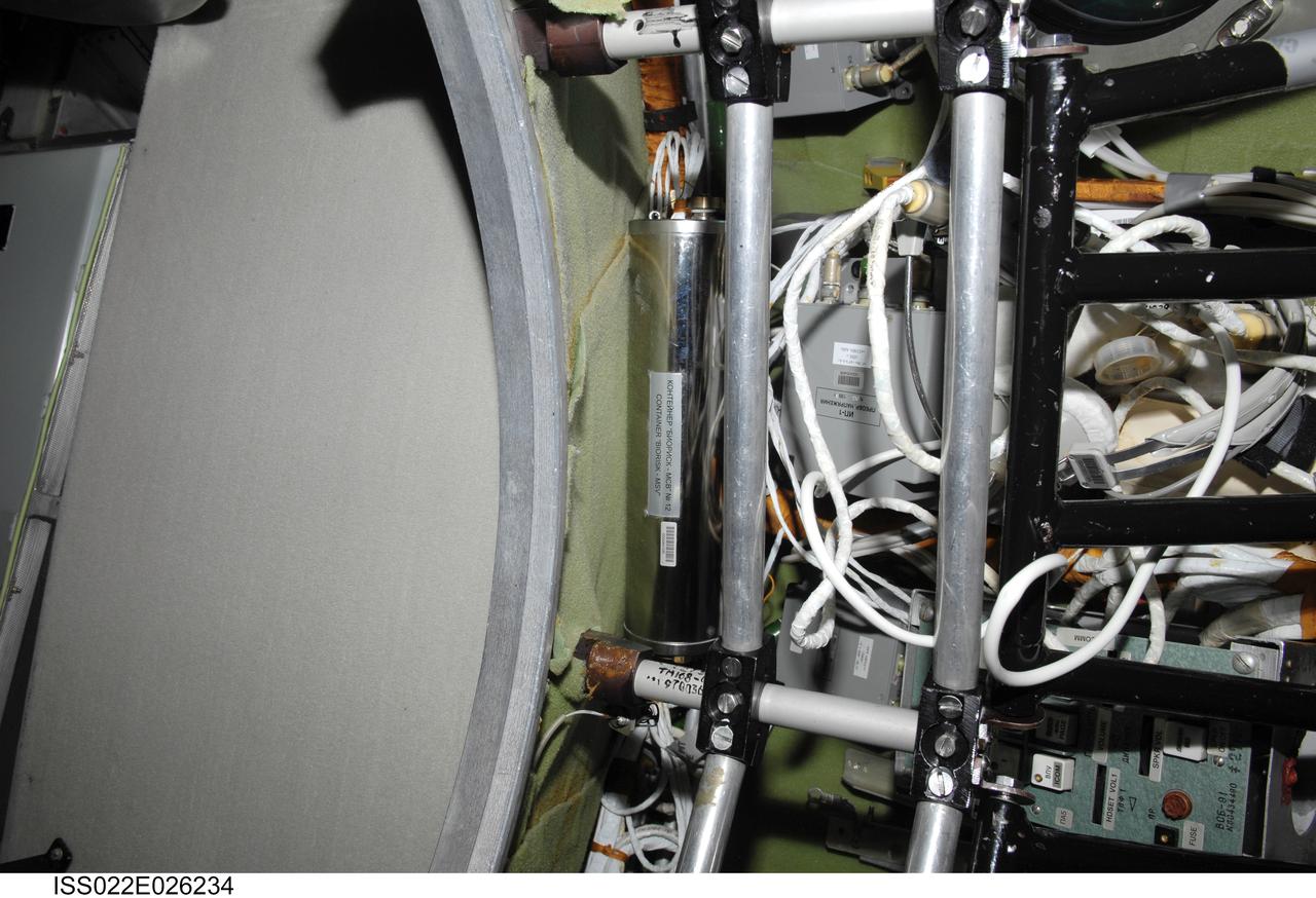 iss022e026234 (1/20/2010) --- A view of Container Biorisk MSV No. 12, in the Service Module (SM) aboard the International Space Station (ISS). The Influence of Factors of the Space Environment on the Condition of the System of Microorganisms-Hosts Relating to the Problem of Environmental Safety of Flight Techniques and Planetary Quarantine (Biorisk) investigation aims to obtain new data on physical and genetic changes in bacteria and fungi typically found on spacecraft equipment, and also in various biological test objects (higher plant seeds, dormant forms of lower crustaceans) under exposure in the interior ISS compartments and on the exterior ISS surfaces.