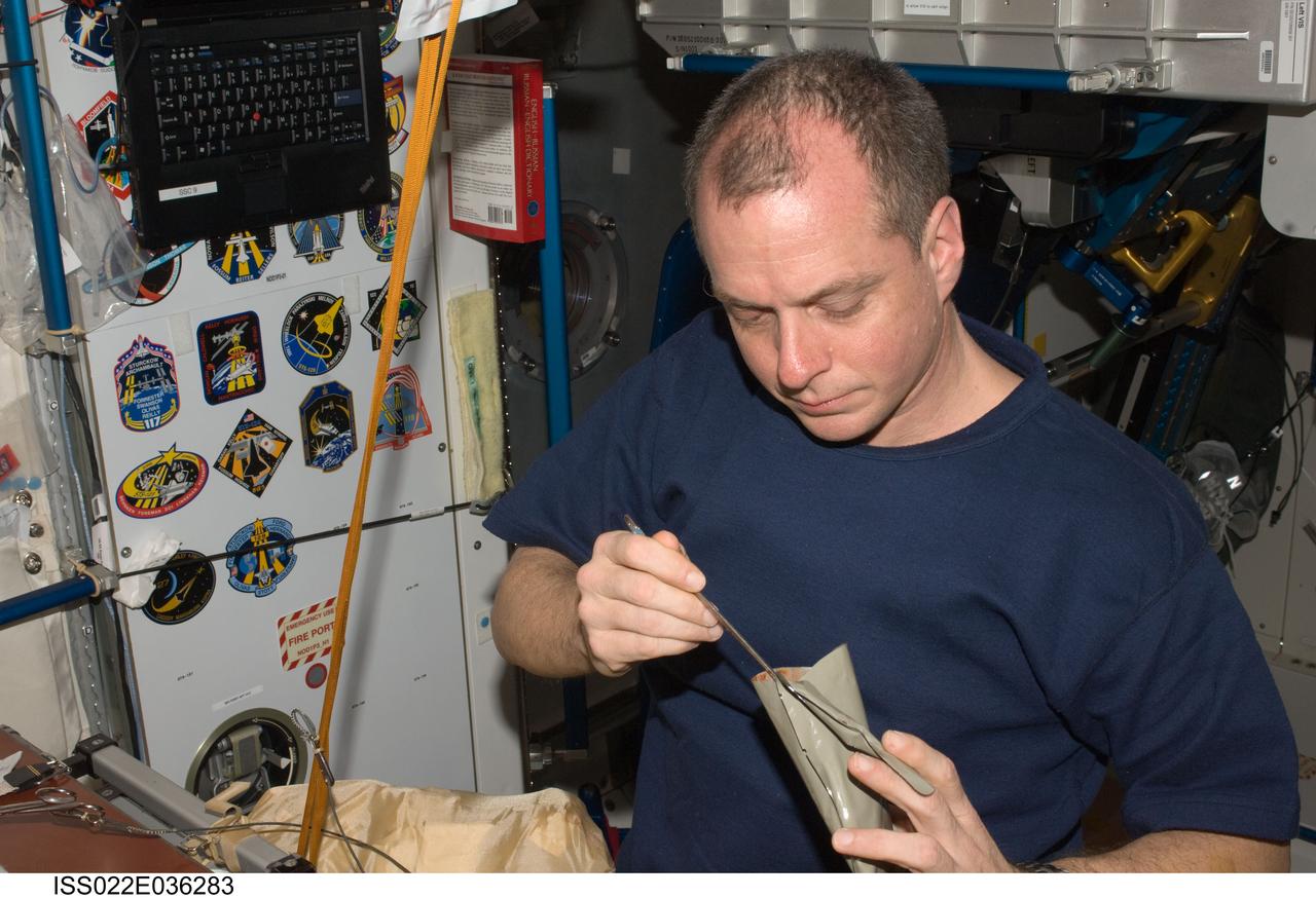 ISS022-E-036283 (21 Jan. 2010) --- NASA astronaut T.J. Creamer, Expedition 22 flight engineer, eats a meal near the galley in the Unity node of the International Space Station.