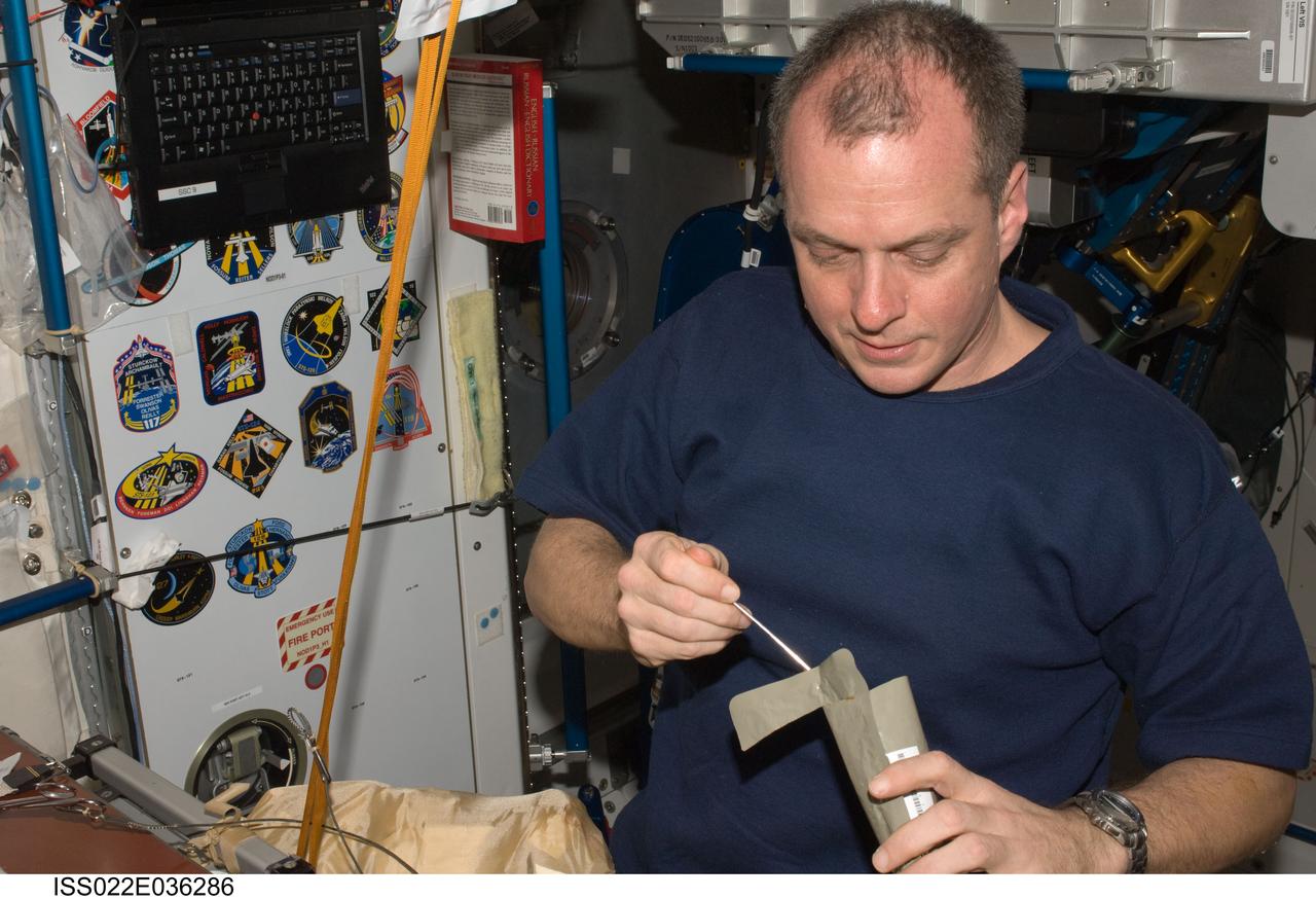 ISS022-E-036286 (21 Jan. 2010) --- NASA astronaut T.J. Creamer, Expedition 22 flight engineer, eats a meal near the galley in the Unity node of the International Space Station.