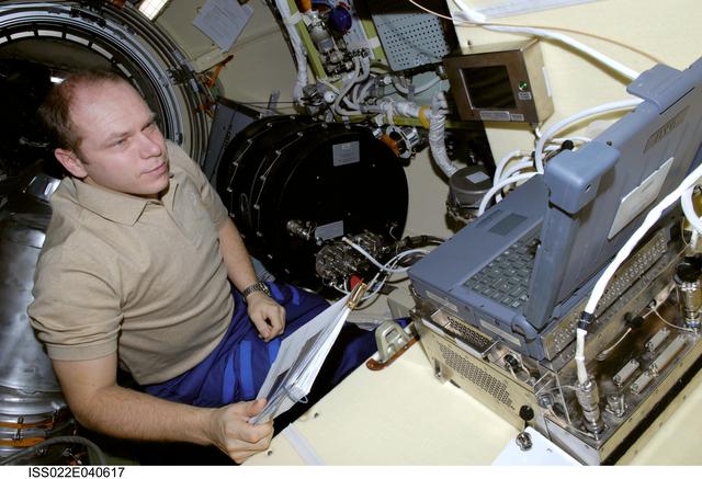 NASA image: Kotov works with Plasma Crystal-3+ Experiment in the SM during Expedition 22