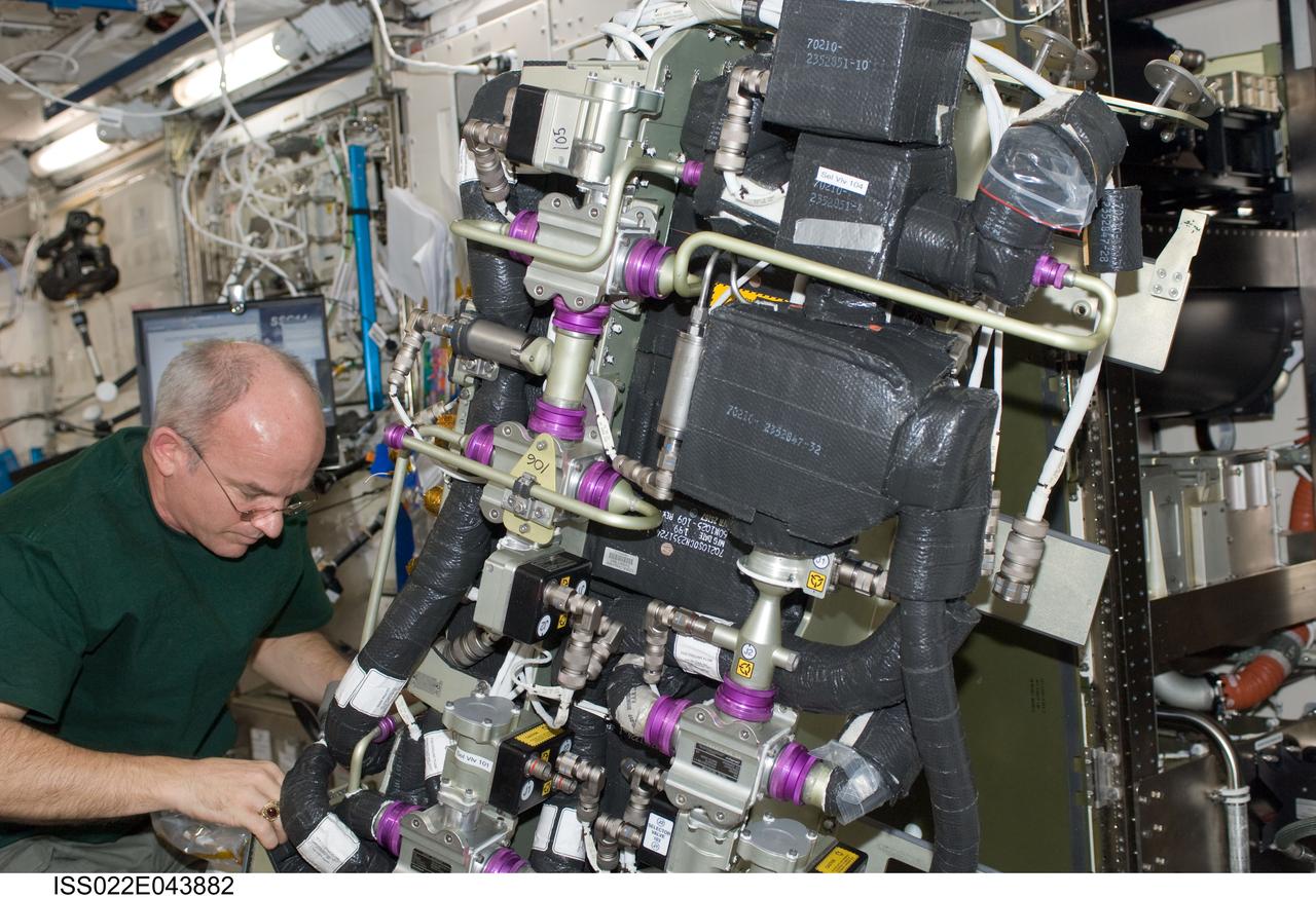 ISS022-E-043882 (28 Jan. 2010) --- NASA astronaut Jeffrey Williams, Expedition 22 commander, performs in-flight maintenance (IFM) on the Carbon Dioxide Removal Assembly (CDRA) in the Kibo laboratory of the International Space Station.