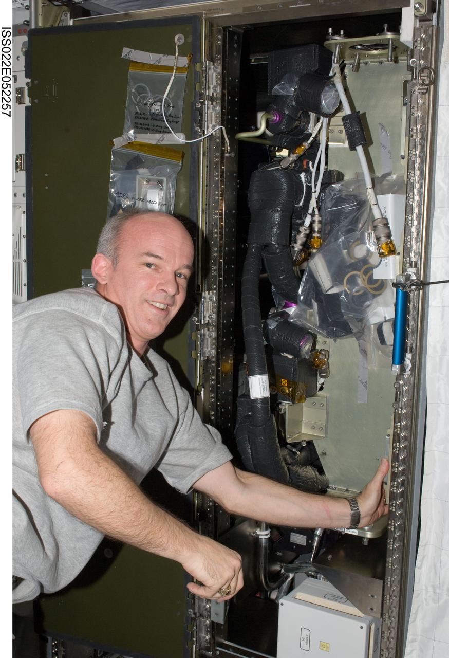 ISS022-E-052257 (29 Jan. 2010) --- NASA astronaut Jeffrey Williams, Expedition 22 commander, performs in-flight maintenance (IFM) on the Carbon Dioxide Removal Assembly (CDRA) in the Kibo laboratory of the International Space Station.