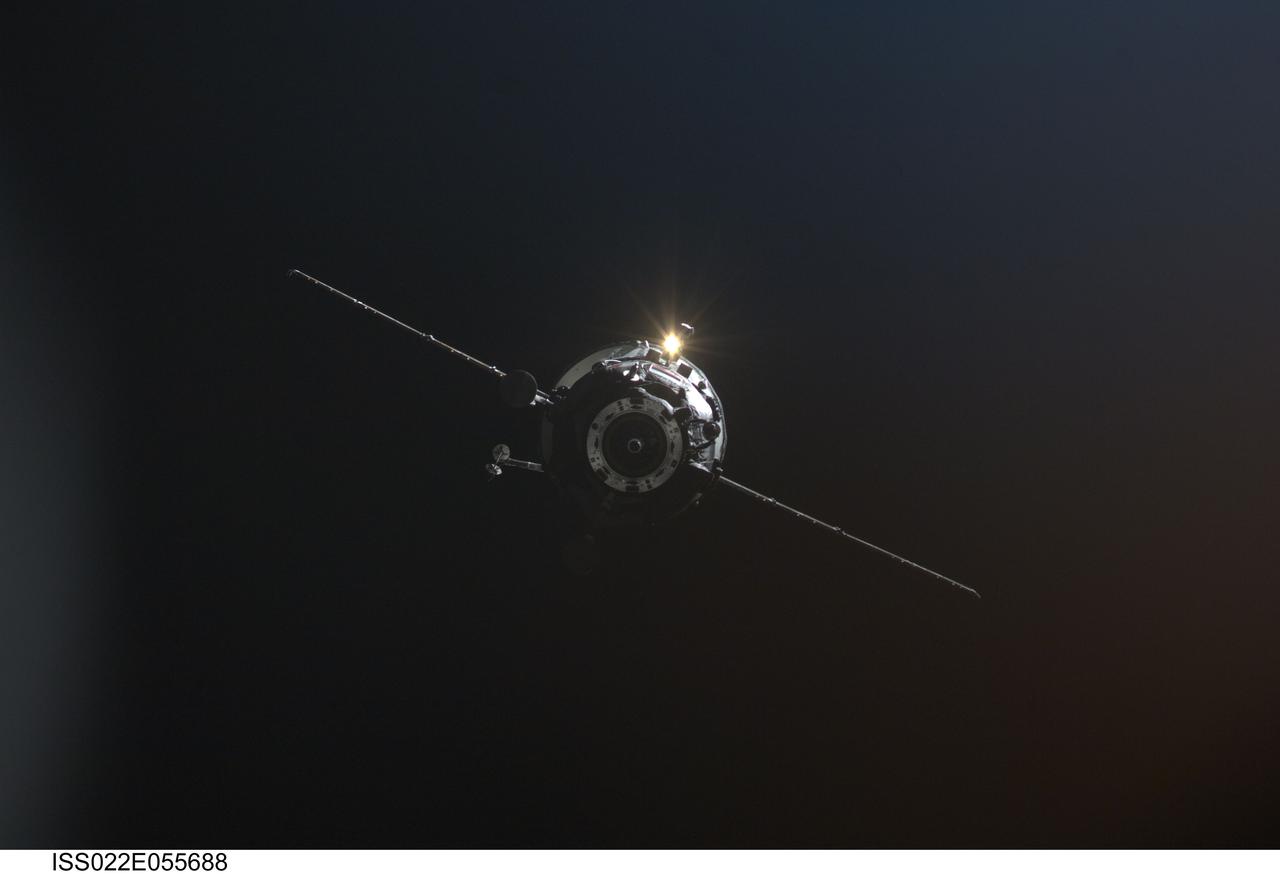 ISS022-E-055688 (4 Feb. 2010) --- An unpiloted ISS Progress resupply vehicle approaches the International Space Station, bringing over two tons of food, fuel and supplies for the Expedition 22 crew members aboard the station. Progress 36 docked to the aft port of the Zvezda Service Module at 10:26 p.m. (CST) on Feb. 4, 2010, after a three-day flight from the Baikonur Cosmodrome in Kazakhstan.