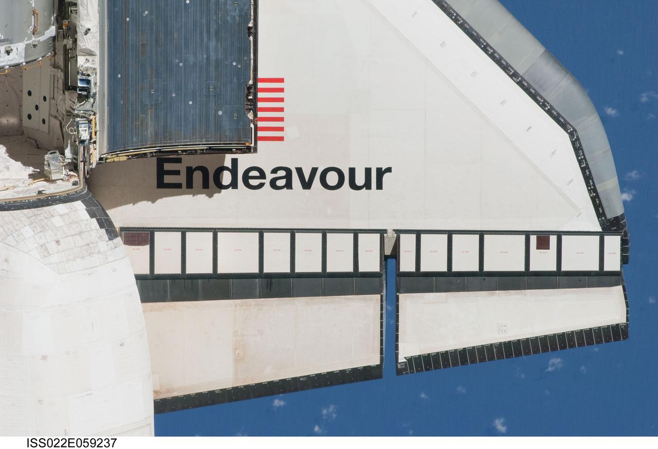 ISS022-E-059237 (9 Feb. 2010) --- This partial view of the starboard wing of the space shuttle Endeavour was provided by an Expedition 22 crew member during a survey of the approaching STS-130 vehicle prior to docking with the International Space Station. As part of the survey and part of every mission's activities, Endeavour performed a back-flip for the rendezvous pitch maneuver (RPM). The image was photographed with a digital still camera, using a 400mm lens at a distance of about 600 feet (180 meters).