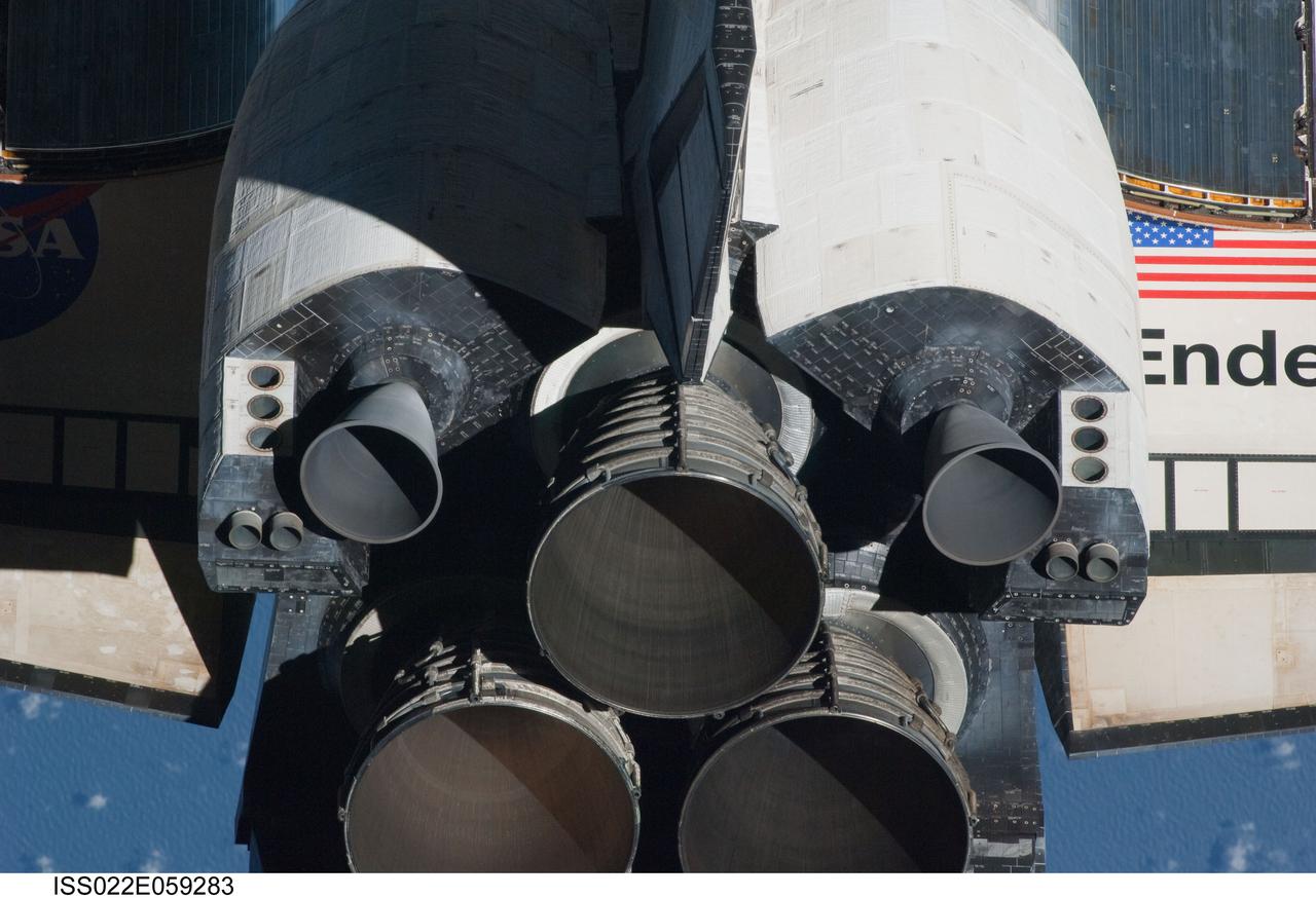 ISS022-E-059283 (9 Feb. 2010) --- This view of the aft portion of the space shuttle Endeavour, including the three main engines and orbital maneuvering system (OMS) pods, was provided by an Expedition 22 crew member during a survey of the approaching vehicle prior to docking with the International Space Station. As part of the survey and part of every mission's activities, Endeavour performed a back-flip for the rendezvous pitch maneuver (RPM). The image was photographed with a digital still camera, using a 400mm lens at a distance of about 600 feet (180 meters).
