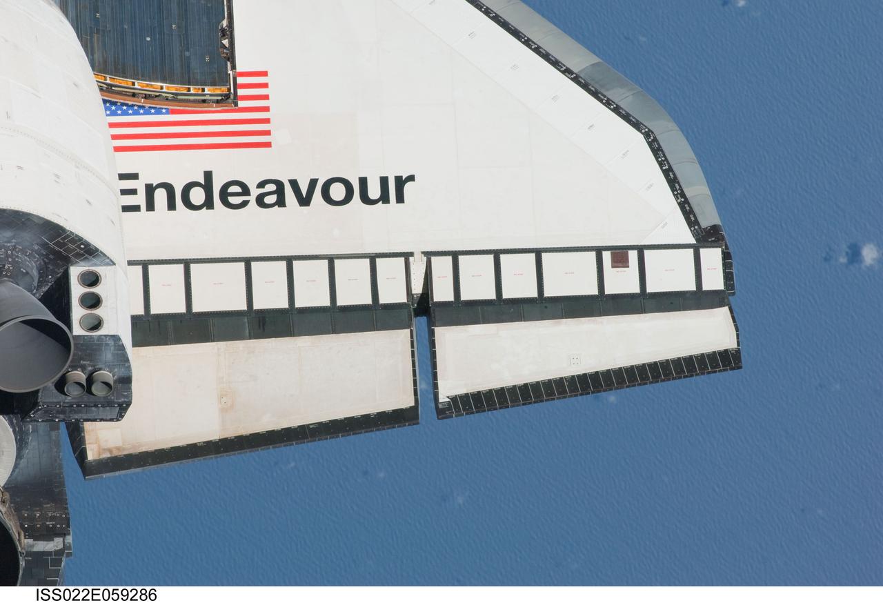 ISS022-E-059286 (9 Feb. 2010) --- This partial view of the starboard wing of the space shuttle Endeavour was provided by an Expedition 22 crew member during a survey of the approaching STS-130 vehicle prior to docking with the International Space Station. As part of the survey and part of every mission's activities, Endeavour performed a back-flip for the rendezvous pitch maneuver (RPM). The image was photographed with a digital still camera, using a 400mm lens at a distance of about 600 feet (180 meters).