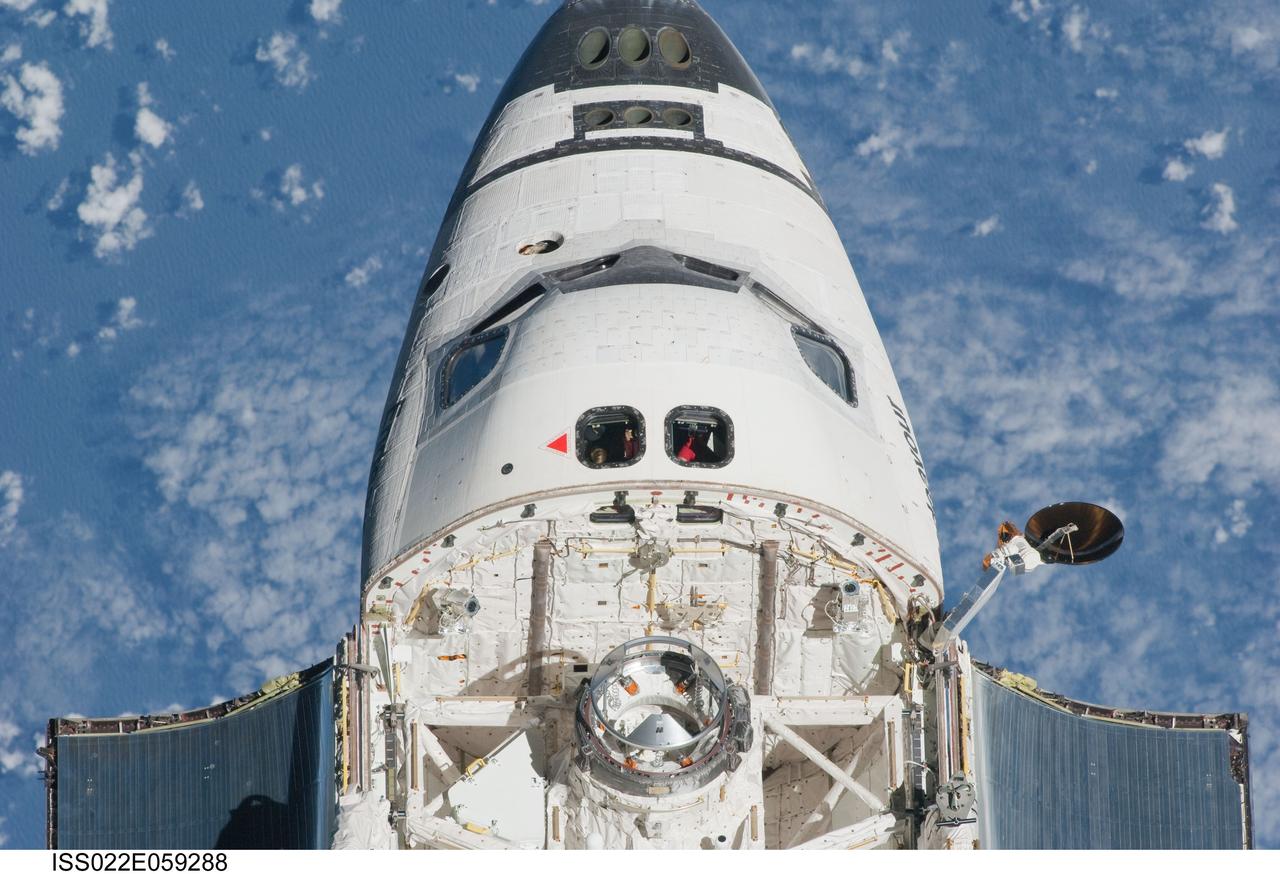 ISS022-E-059288 (9 Feb. 2010) --- This partial view of the crew cabin and forward payload bay of the space shuttle Endeavour was provided by an Expedition 22 crew member during a survey of the approaching vehicle prior to docking with the International Space Station. As part of the survey and part of every mission's activities, the STS-130 Endeavour crew performed a back-flip for the rendezvous pitch maneuver (RPM). The image was photographed with a digital still camera, using a 400mm lens at a distance of about 600 feet (180 meters).