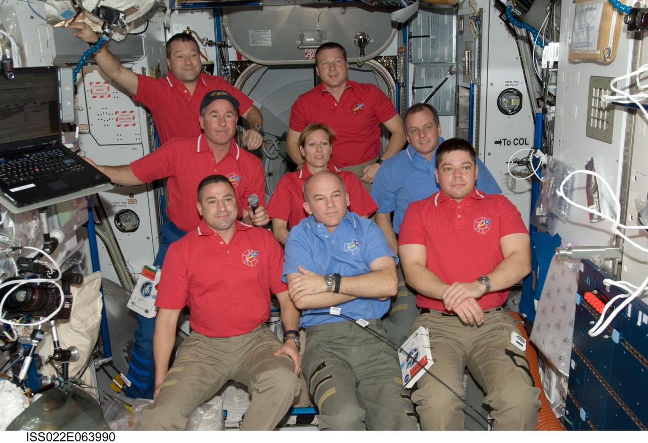 ISS022-E-063990 (10 Feb. 2010) --- Eight NASA astronauts serving two space-faring crews, talk to several news media outlets from onboard the International Space Station in the midst of several days of shared duties. On the front row, from the left, are astronauts George Zamka, STS-130 commander; Jeffrey Williams, Expedition 22 commander; and Robert Behnken, STS-130 mission specialist. From left, middle row, are astronauts Stephen Robinson and Kathryn Hire, both STS-130 mission specialists; and T.J. Creamer, space station flight engineer. In the rear are astronauts Nicholas Patrick (left), STS-130 mission specialist, and Terry Virts, STS-130 pilot. The two crews, totaling eleven cosmonauts and astronauts, will be sharing duties for more than a week and are scheduled to team up for three spacewalks in the coming days. Astronauts Behnken and Patrick of the STS-130 crew are scheduled for the outside portion of all three spacewalks.