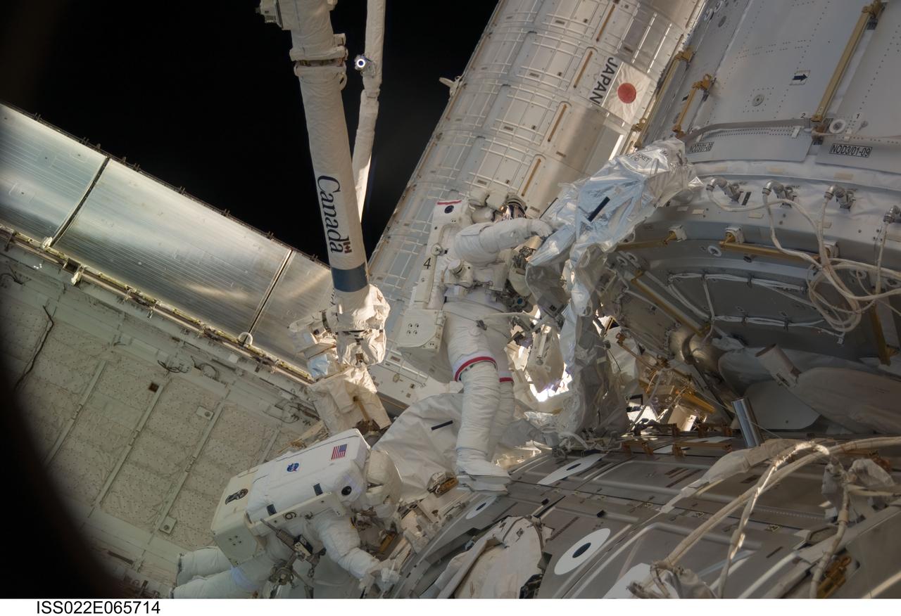 ISS022-E-065714 (14 Feb. 2010) --- NASA astronauts Robert Behnken (right) and Nicholas Patrick, both STS-130 mission specialists, participate in the mission?s second session of extravehicular activity (EVA) as construction and maintenance continue on the International Space Station. During the five-hour, 54-minute spacewalk, Behnken and Patrick connected two ammonia coolant loops, installed thermal covers around the ammonia hoses, outfitted the Earth-facing port on the Tranquility node for the relocation of its Cupola, and installed handrails and a vent valve on the new module.