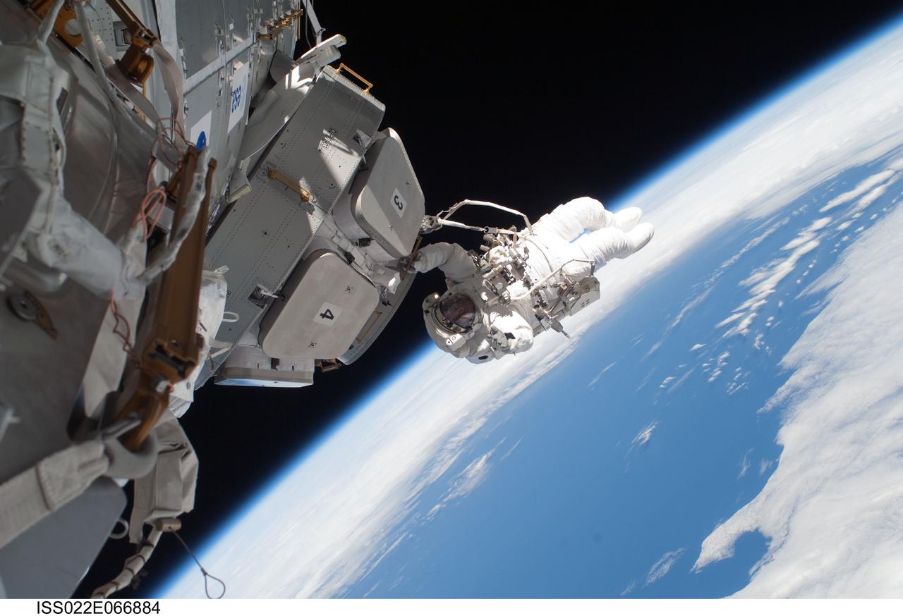 ISS022-E-066884 (17 Feb. 2010) --- NASA astronaut Nicholas Patrick, STS-130 mission specialist, participates in the mission’s third and final session of extravehicular activity (EVA) as construction and maintenance continue on the International Space Station. During the five-hour, 48-minute spacewalk, Patrick and astronaut Robert Behnken (out of frame), mission specialist, completed all of their planned tasks, removing insulation blankets and removing launch restraint bolts from each of the Cupola’s seven windows.