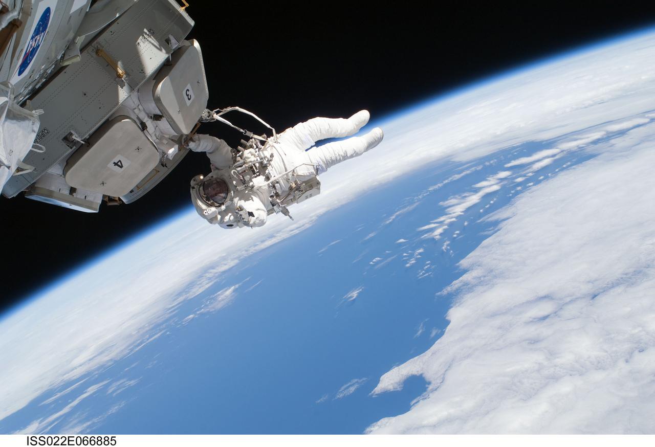 ISS022-E-066885 (17 Feb. 2010) --- NASA astronaut Nicholas Patrick, STS-130 mission specialist, participates in the mission’s third and final session of extravehicular activity (EVA) as construction and maintenance continue on the International Space Station. During the five-hour, 48-minute spacewalk, Patrick and astronaut Robert Behnken (out of frame), mission specialist, completed all of their planned tasks, removing insulation blankets and removing launch restraint bolts from each of the Cupola’s seven windows.