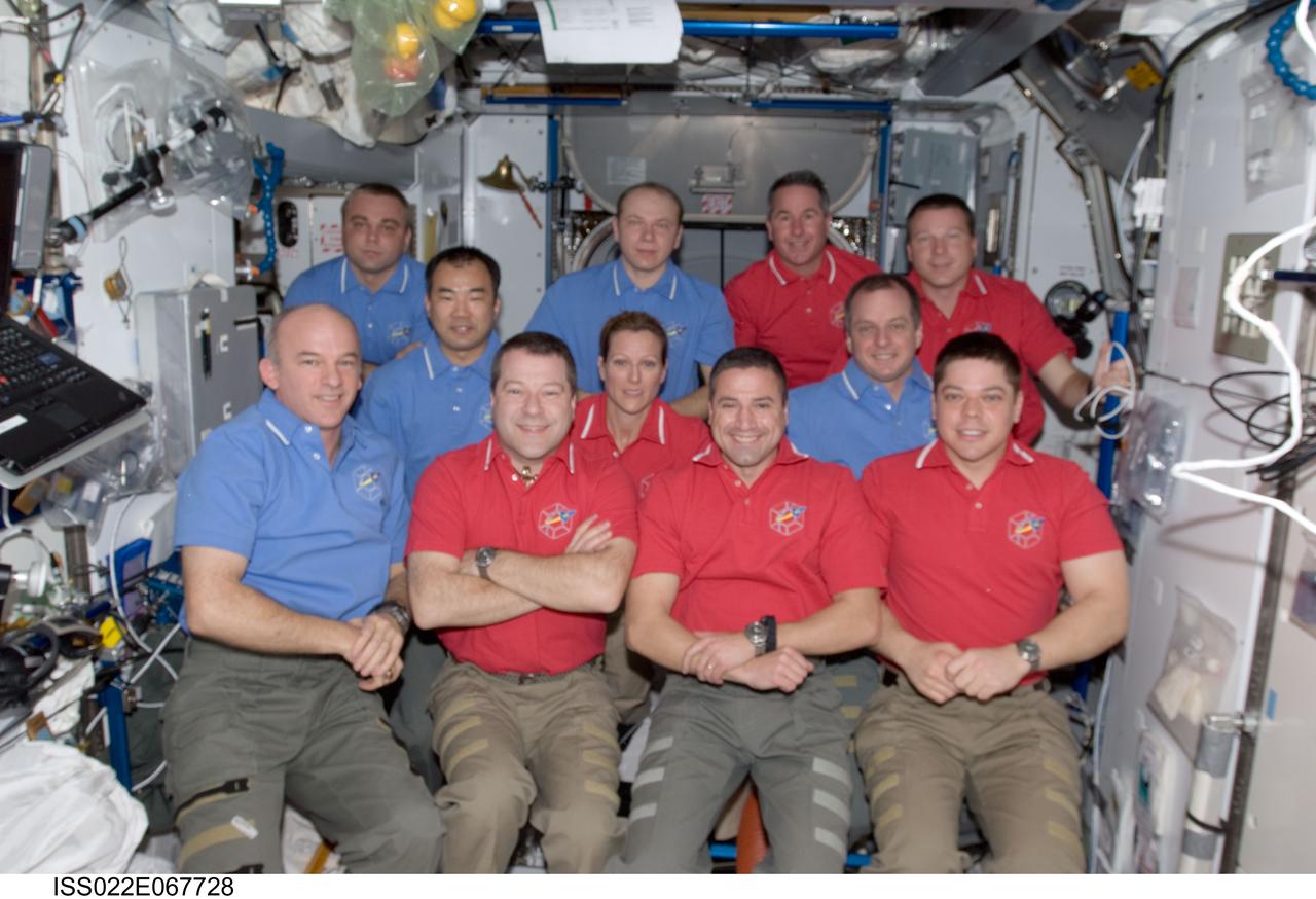 ISS022-E-067728 (17 Feb. 2010) --- STS-130 and Expedition 22 crew members gather for a group portrait in the Harmony node of the International Space Station while space shuttle Endeavour remains docked with the station. Pictured from the left (front row) are NASA astronauts Jeffrey Williams, Expedition 22 commander; Nicholas Patrick, STS-130 mission specialist; George Zamka, STS-130 commander; and Robert Behnken, STS-130 mission specialist. Pictured from the left (middle row) are Japan Aerospace Exploration Agency (JAXA) astronaut Soichi Noguchi, Expedition 22 flight engineer; NASA astronauts Kathryn Hire, STS-130 mission specialist; and T.J. Creamer, Expedition 22 flight engineer. Pictured from the left (back row) are Russian cosmonauts Maxim Suraev and Oleg Kotov, both Expedition 22 flight engineer; along with NASA astronauts Stephen Robinson, STS-130 mission specialist; and Terry Virts, STS-130 pilot.