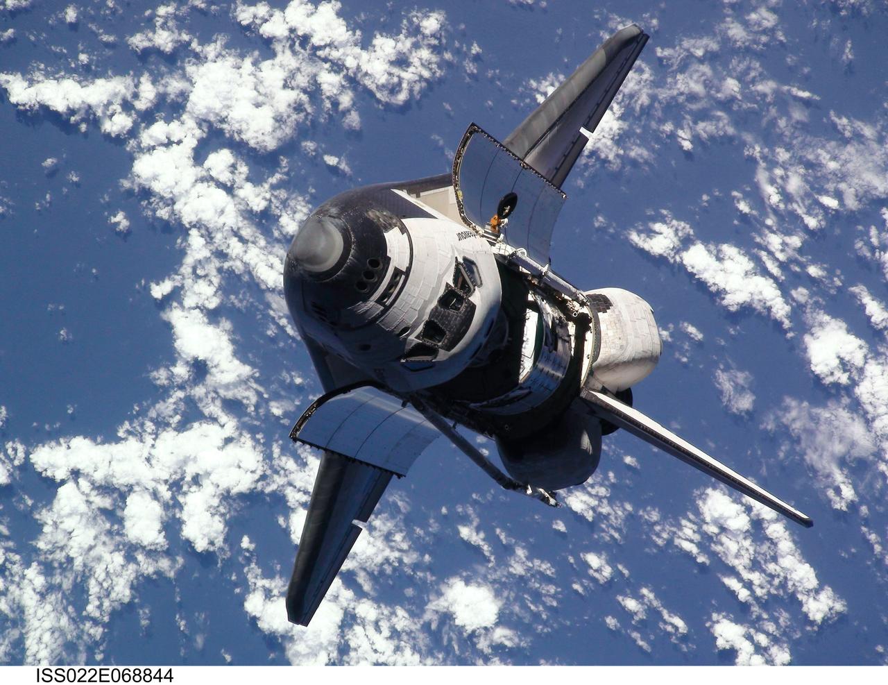 ISS022-E-068844 (9 Feb. 2010) --- This view of the space shuttle Endeavour, taken from the International Space Station on Feb. 9 as the two spacecraft conducted their rendezvous operations, was downlinked by the Expedition 22 crew on Feb. 19. The Tranquility node and the Cupola can be clearly seen in the shuttle's payload bay.
