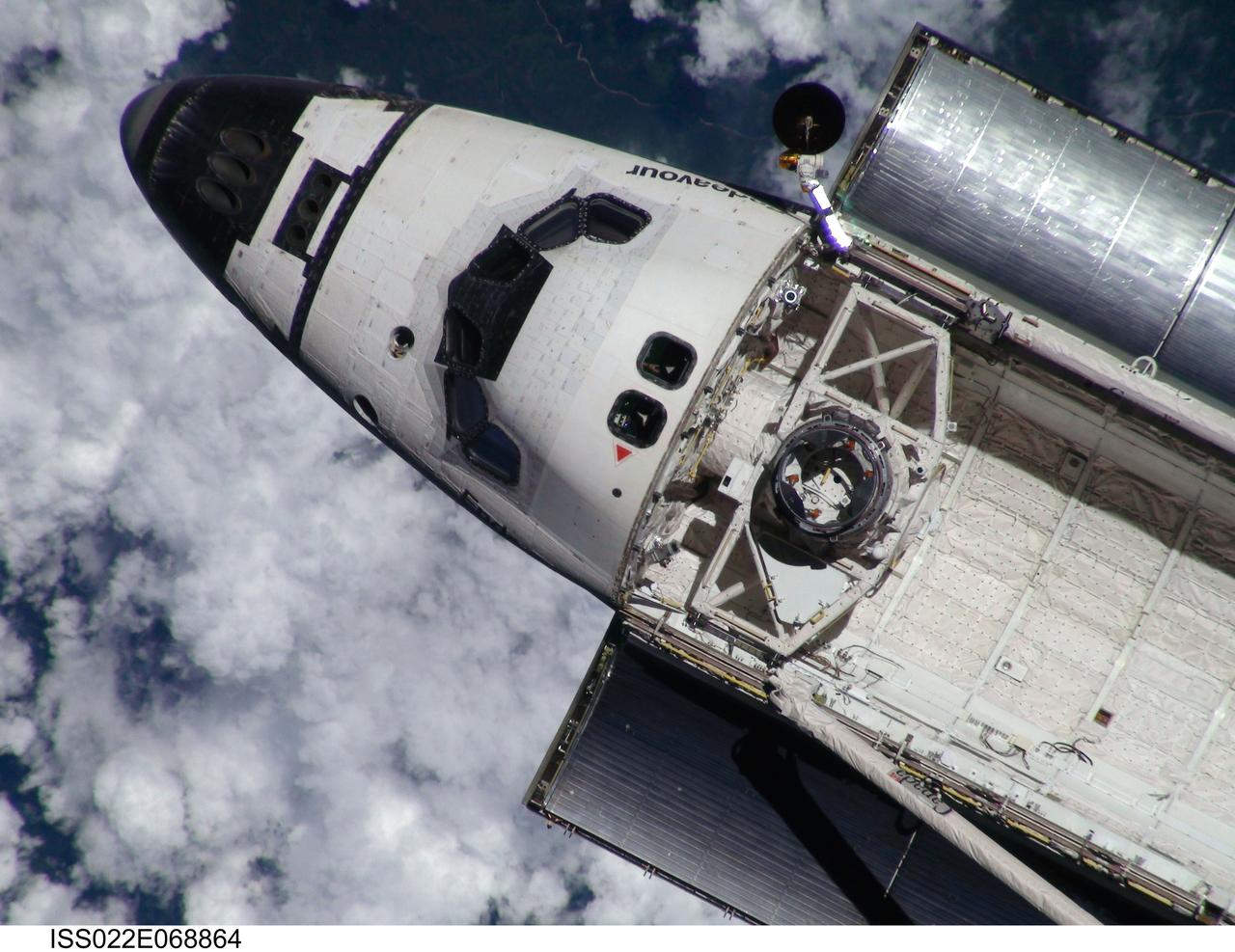 ISS022-E-068864 (9 Feb. 2010) --- This view of the space shuttle Endeavour, taken on Feb. 9 from the International Space Station as the two spacecraft conducted their rendezvous operations, was downlinked by the Expedition 22 crew on Feb. 19. The Tranquility node and the Cupola are just out of view in the aft part of shuttle's payload bay.