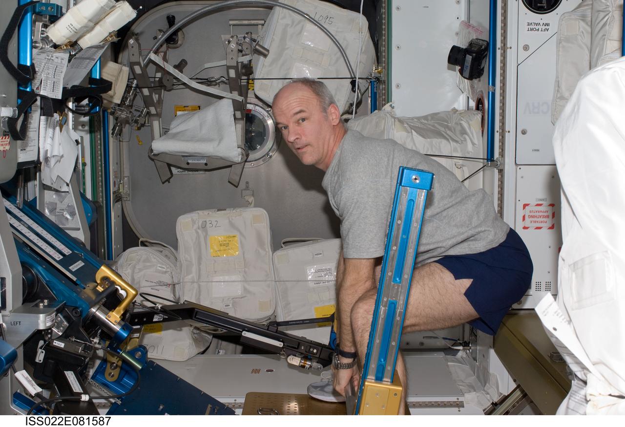 ISS022-E-081587 (28 Feb. 2010) --- NASA astronaut Jeffrey Williams, Expedition 22 commander, exercises using the advanced Resistive Exercise Device (aRED) in the Tranquility node of the International Space Station.