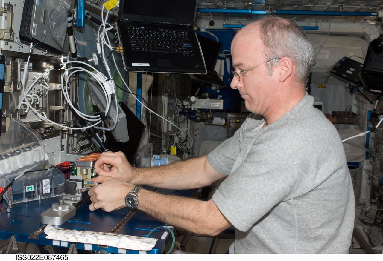 ISS022-E-087465 (9 March 2010) --- NASA astronaut Jeffrey Williams, Expedition 22 commander, services the Tropism in Plants (TROPI2) experiment in the Columbus laboratory of the International Space Station.