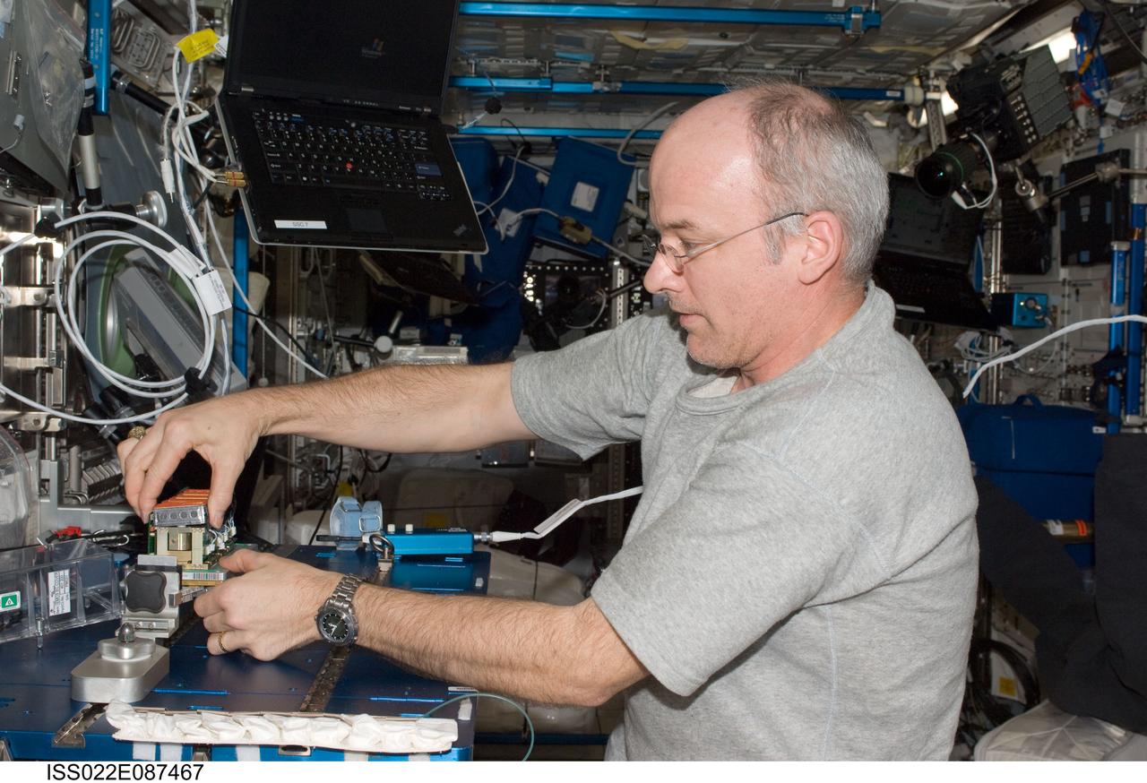 ISS022-E-087467 (9 March 2010) --- NASA astronaut Jeffrey Williams, Expedition 22 commander, services the Tropism in Plants (TROPI2) experiment in the Columbus laboratory of the International Space Station.