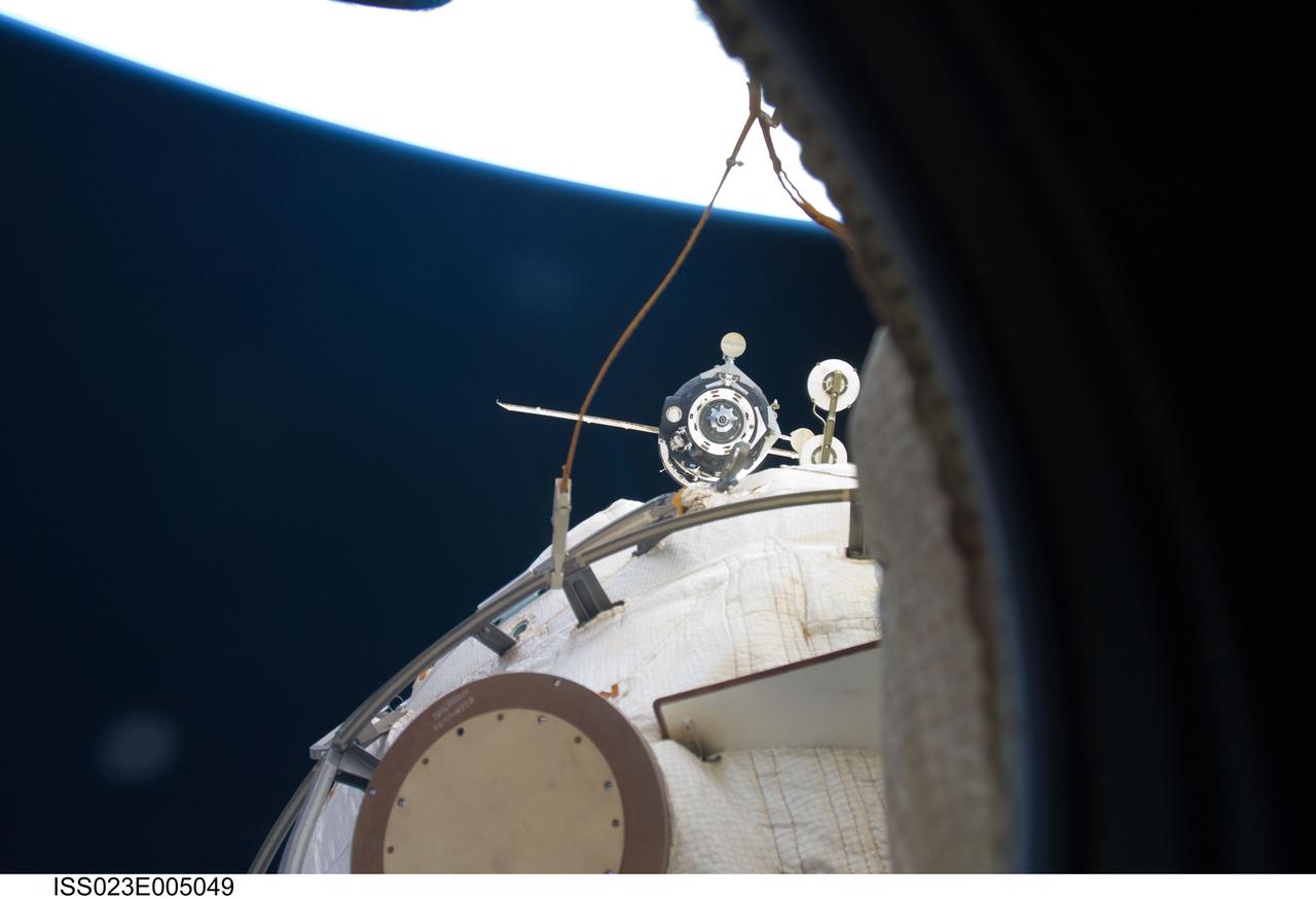 ISS023-E-005049 (18 March 2010) --- The Soyuz TMA-16 spacecraft departs from the International Space Station carrying NASA astronaut Jeffrey Williams, Expedition 22 commander; and Russian cosmonaut Maxim Suraev, Soyuz commander and flight engineer. Undocking occurred at 4:03 a.m. (EDT) on March 18, 2010. Suraev guided the spacecraft to a parachute-assisted landing at 7:24 a.m. near the town of Arkalyk, Kazakhstan, wrapping up a five-and-a-half-month stay aboard the space station.
