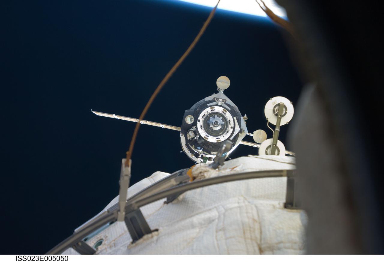 ISS023-E-005050 (18 March 2010) --- The Soyuz TMA-16 spacecraft departs from the International Space Station carrying NASA astronaut Jeffrey Williams, Expedition 22 commander; and Russian cosmonaut Maxim Suraev, Soyuz commander and flight engineer. Undocking occurred at 4:03 a.m. (EDT) on March 18, 2010. Suraev guided the spacecraft to a parachute-assisted landing at 7:24 a.m. near the town of Arkalyk, Kazakhstan, wrapping up a five-and-a-half-month stay aboard the space station.