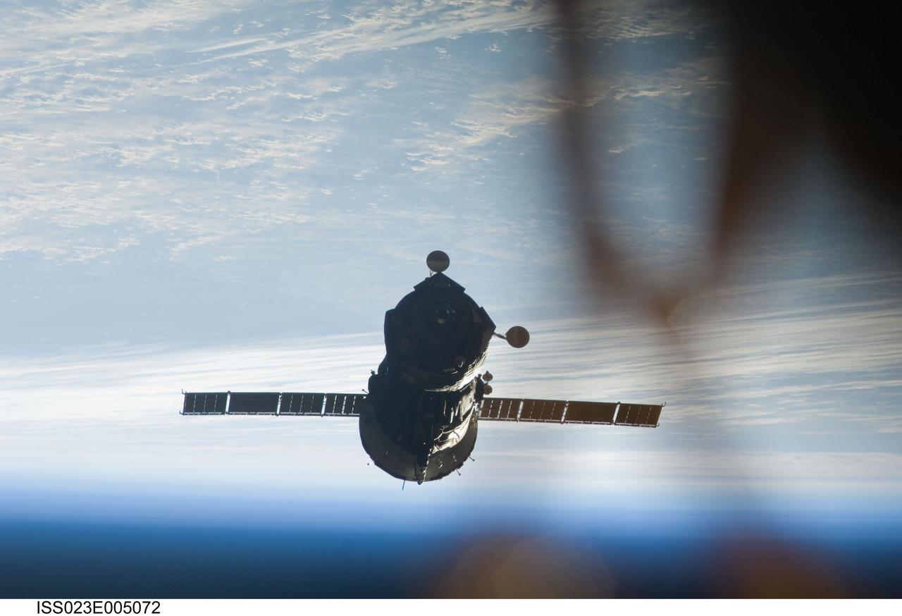 ISS023-E-005072 (18 March 2010) --- The Soyuz TMA-16 spacecraft departs from the International Space Station carrying NASA astronaut Jeffrey Williams, Expedition 22 commander; and Russian cosmonaut Maxim Suraev, Soyuz commander and flight engineer. Undocking occurred at 4:03 a.m. (EDT) on March 18, 2010. Suraev guided the spacecraft to a parachute-assisted landing at 7:24 a.m. near the town of Arkalyk, Kazakhstan, wrapping up a five-and-a-half-month stay aboard the space station.