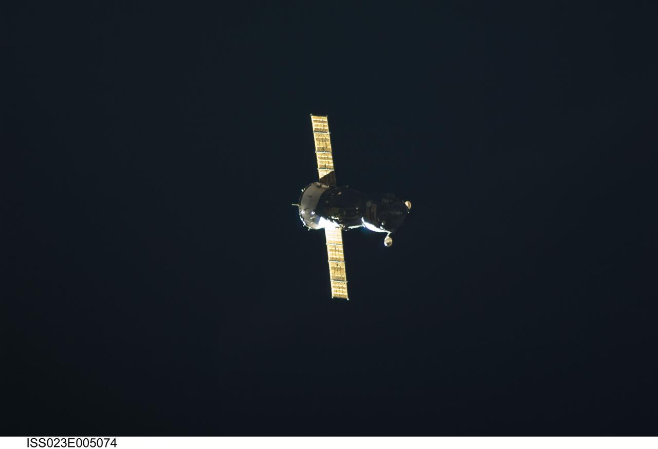 ISS023-E-005074 (18 March 2010) --- The Soyuz TMA-16 spacecraft departs from the International Space Station carrying NASA astronaut Jeffrey Williams, Expedition 22 commander; and Russian cosmonaut Maxim Suraev, Soyuz commander and flight engineer. Undocking occurred at 4:03 a.m. (EDT) on March 18, 2010. Suraev guided the spacecraft to a parachute-assisted landing at 7:24 a.m. near the town of Arkalyk, Kazakhstan, wrapping up a five-and-a-half-month stay aboard the space station.