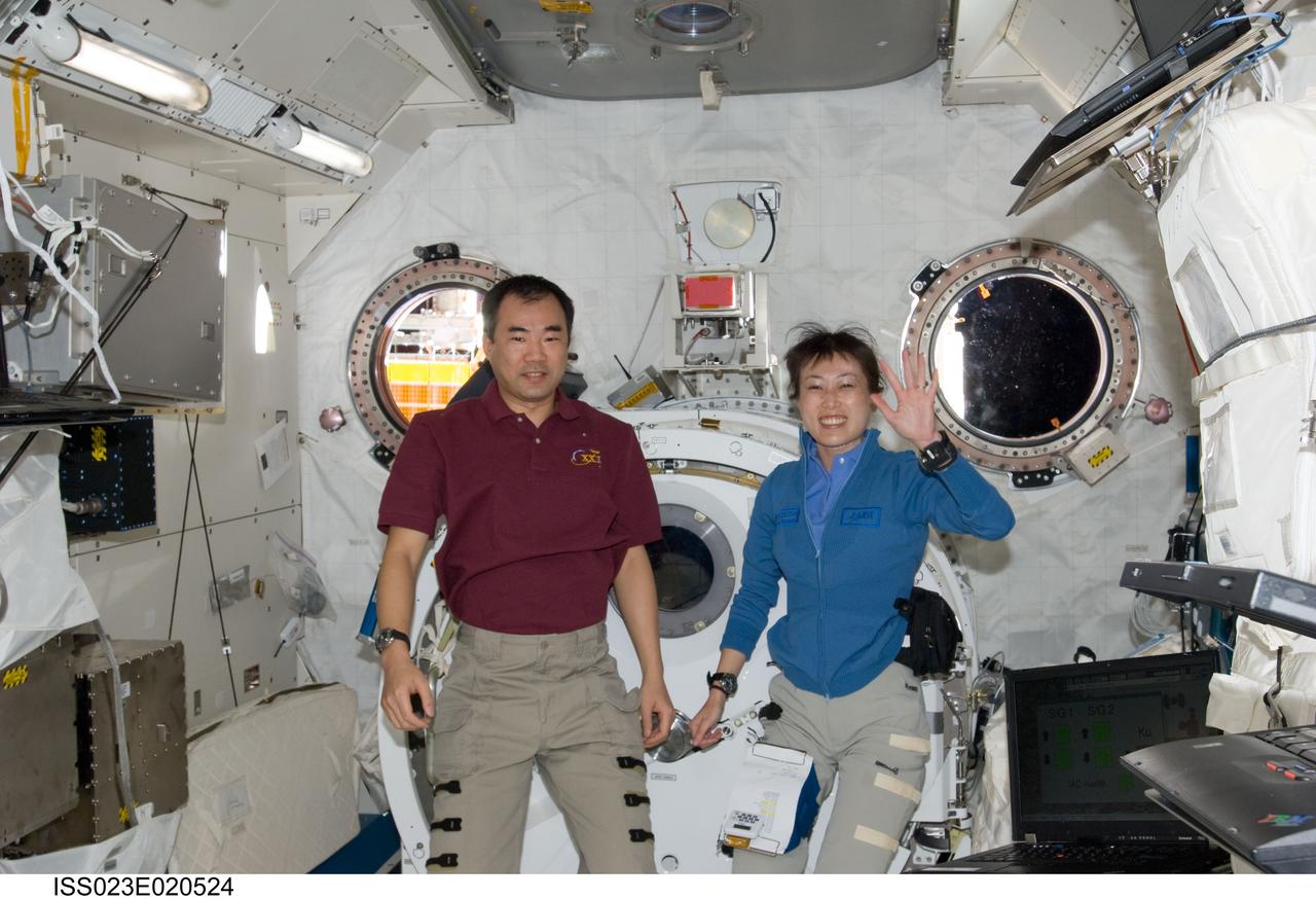 ISS023-E-020524 (7 April 2010) --- Marking the first occasion of more than one astronaut representing the Japan Aerospace Space Agency onboard any space vehicle at any time in history, JAXA astronauts Soichi Noguchi and Naoko Yamazaki reunite in the Japanese Kibo laboratory aboard the International Space Station shortly after it docked with the space shuttle Discovery on April 7. Noguchi, Expedition 22/23 flight engineer, is in the back end of a six month stay aboard the orbital complex. Yamazaki is a mission specialist with the STS-131 crew.