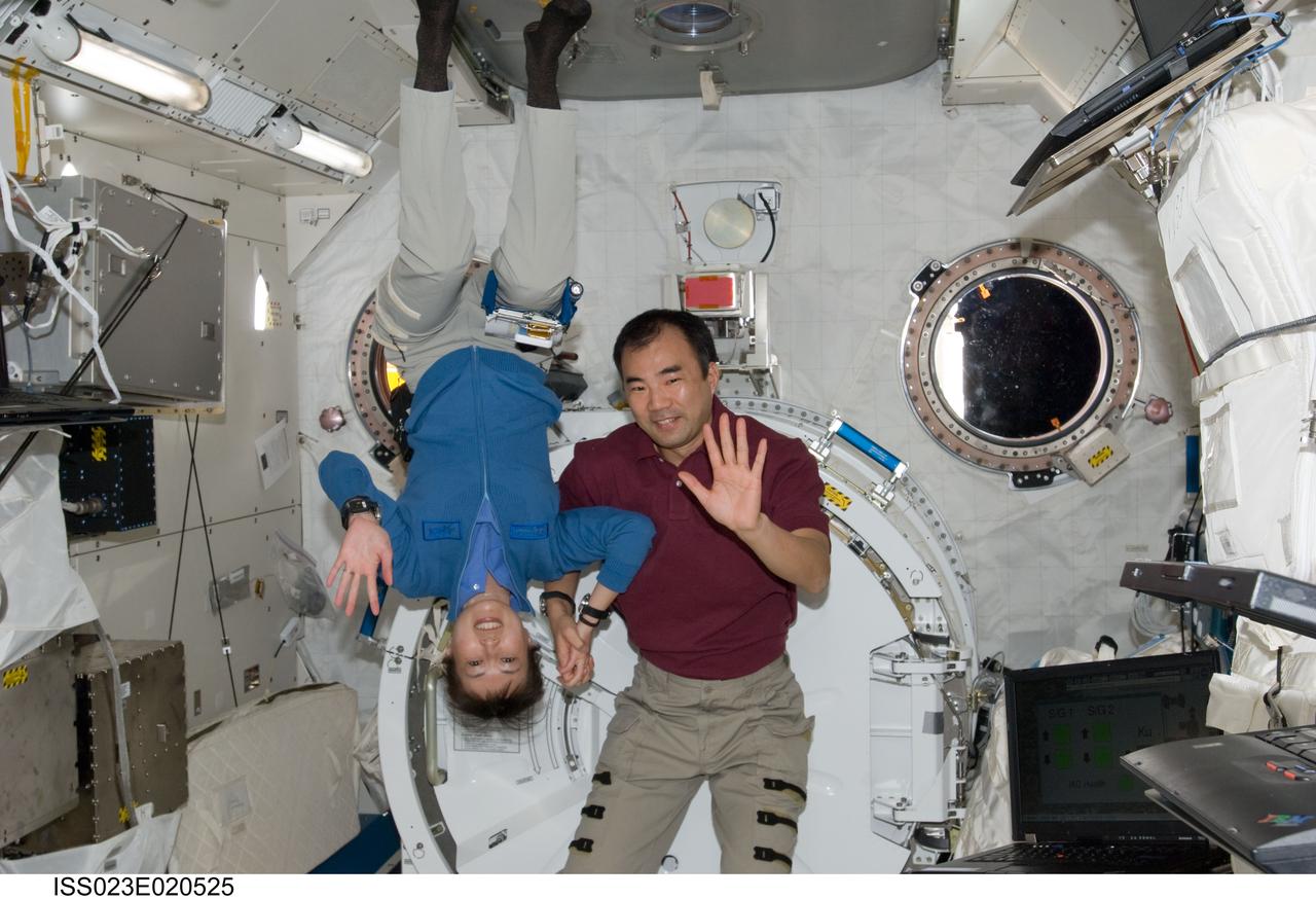 ISS023-E-020525 (7 April 2010) --- Marking the first occasion of more than one astronaut representing the Japan Aerospace Space Agency onboard any space vehicle at any time in history, JAXA astronauts Soichi Noguchi and Naoko Yamazaki reunite in the Japanese Kibo laboratory aboard the International Space Station shortly after it docked with the space shuttle Discovery on April 7. Noguchi, Expedition 22/23 flight engineer, is in the back end of a six month stay aboard the orbital complex. Yamazaki is a mission specialist with the STS-131 crew.