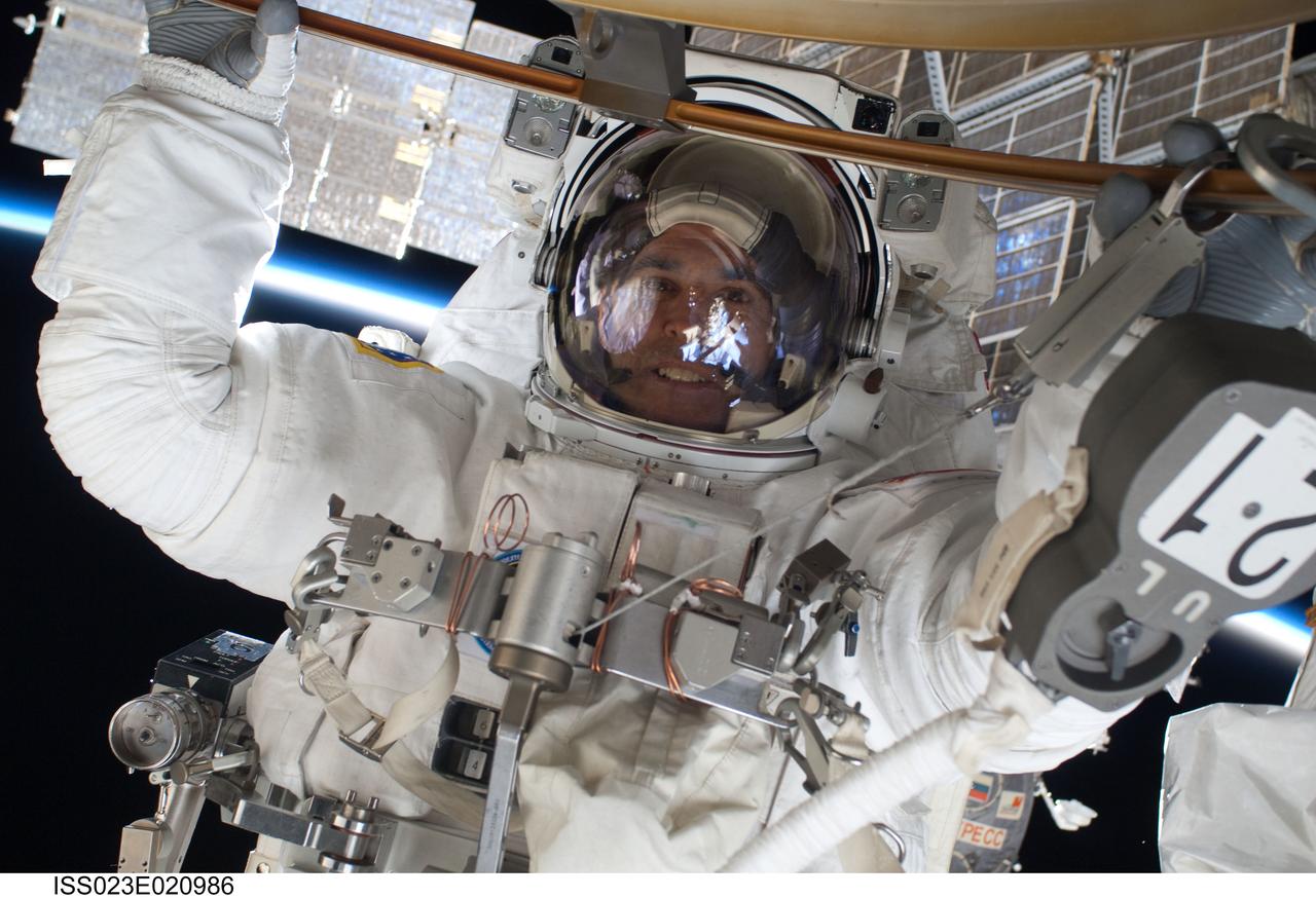 ISS023-E-020986 (9 April 2010) --- NASA astronaut Rick Mastracchio, STS-131 mission specialist, participates in the mission's first session of extravehicular activity (EVA) as construction and maintenance continue on the International Space Station. During the six-hour, 27-minute spacewalk, Mastracchio and astronaut Clayton Anderson (out of frame), mission specialist, helped move a new 1,700-pound ammonia tank from space shuttle Discovery’s cargo bay to a temporary parking place on the station, retrieved an experiment from the Japanese Kibo Laboratory exposed facility and replaced a Rate Gyro Assembly on one of the truss segments.