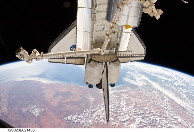 NASA image: Docked Discovery over Australia