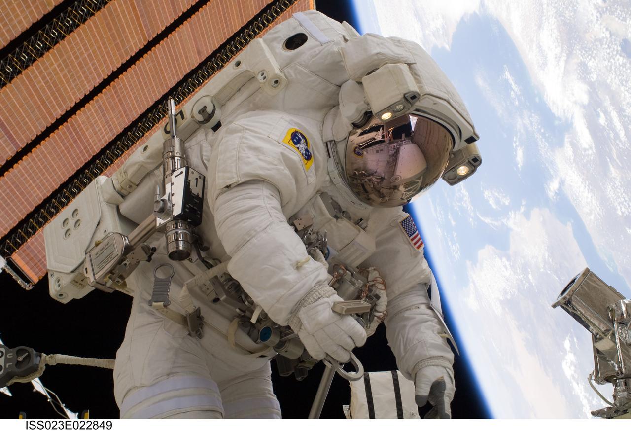 ISS023-E-022849 (13 April 2010) --- NASA astronaut Clayton Anderson, STS-131 mission specialist, participates in the mission's third and final session of extravehicular activity (EVA) as construction and maintenance continue on the International Space Station. During the six-hour, 24-minute spacewalk, Anderson and astronaut Rick Mastracchio (out of frame), mission specialist, hooked up fluid lines of the new 1,700-pound tank, retrieved some micrometeoroid shields from the Quest airlock’s exterior, relocated a portable foot restraint and prepared cables on the Zenith 1 truss for a spare Space to Ground Ku-Band antenna, two chores required before space shuttle Atlantis' STS-132/ULF-4 mission in May.