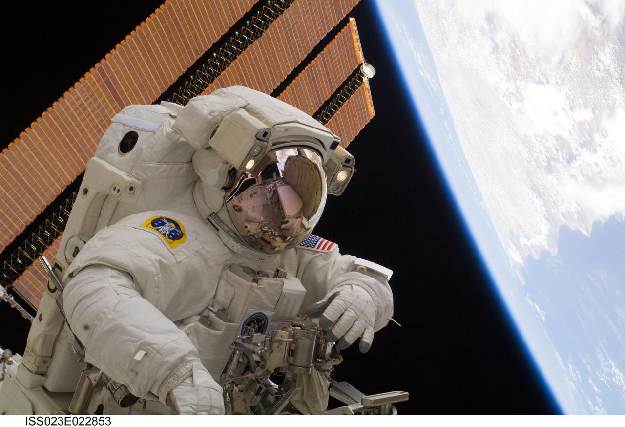 ISS023-E-022853 (13 April 2010) --- NASA astronaut Clayton Anderson, STS-131 mission specialist, participates in the mission's third and final session of extravehicular activity (EVA) as construction and maintenance continue on the International Space Station. During the six-hour, 24-minute spacewalk, Anderson and astronaut Rick Mastracchio (out of frame), mission specialist, hooked up fluid lines of the new 1,700-pound tank, retrieved some micrometeoroid shields from the Quest airlock’s exterior, relocated a portable foot restraint and prepared cables on the Zenith 1 truss for a spare Space to Ground Ku-Band antenna, two chores required before space shuttle Atlantis' STS-132/ULF-4 mission in May.