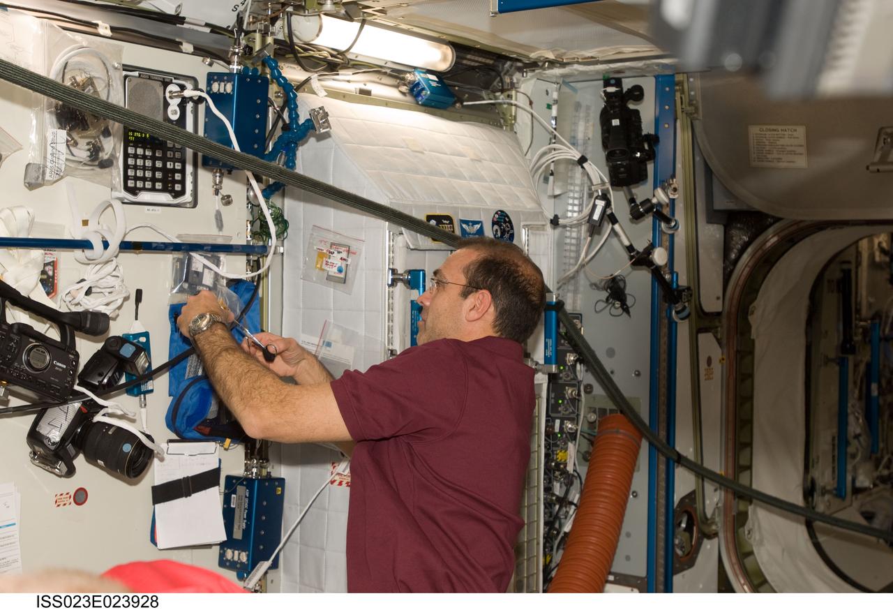 SS023-E-023928 (15 April 2010) --- NASA astronaut Rick Mastracchio, STS-131 mission specialist, is pictured in the Harmony node of the International Space Station while space shuttle Discovery remains docked with the station.