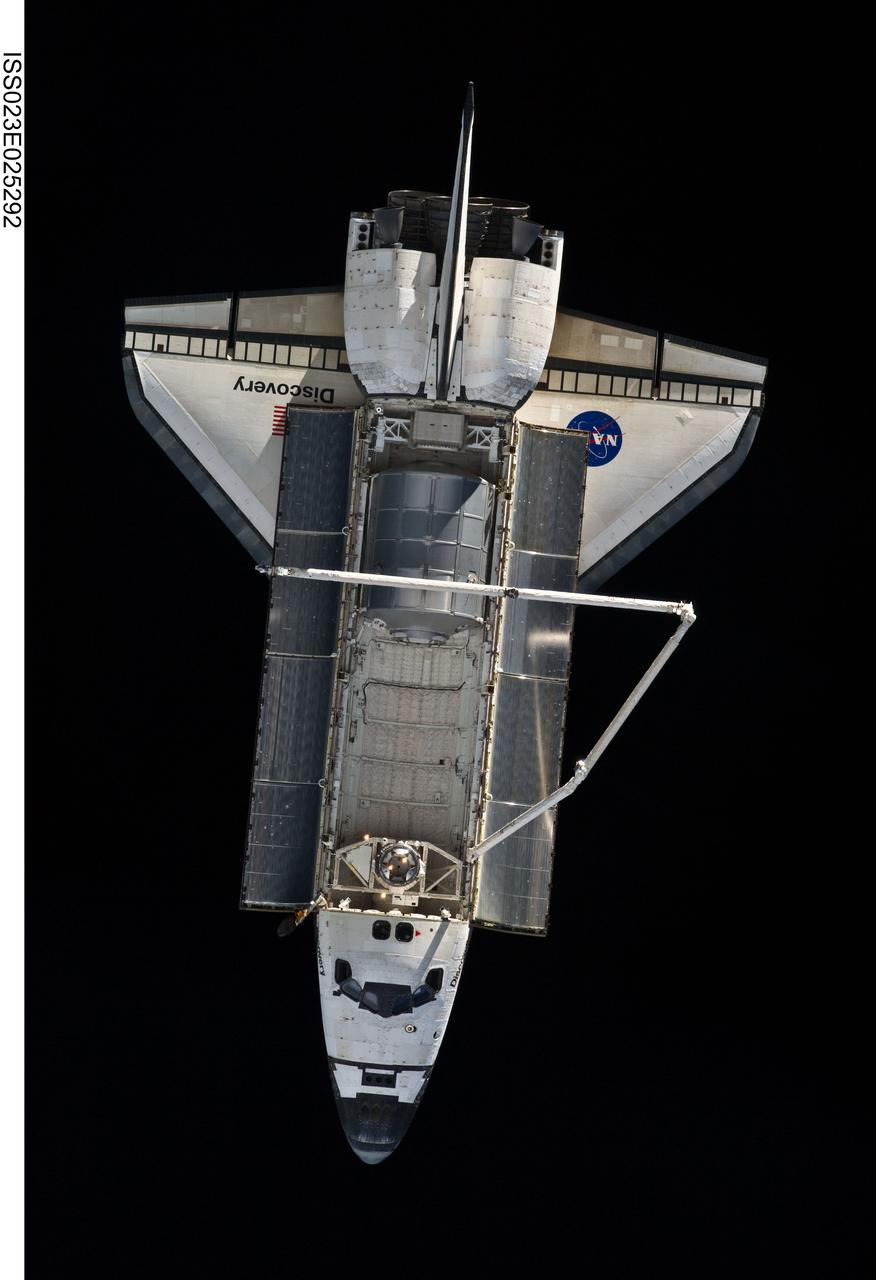 ISS023-E-025292 (17 April 2010) --- Space shuttle Discovery is featured in this image photographed by an Expedition 23 crew member on the International Space Station soon after the shuttle and station began their post-undocking relative separation. Undocking of the two spacecraft occurred at 7:52 a.m. (CDT) on April 17, 2010, ending a stay of 10 days, 5 hours and 8 minutes. The visit included three spacewalks and delivery of more than seven tons of equipment and supplies.