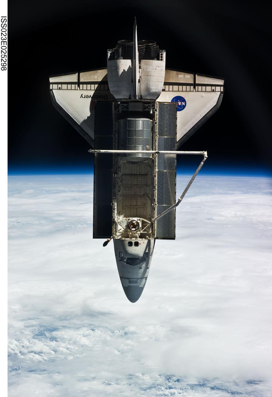 ISS023-E-025298 (17 April 2010) --- Space shuttle Discovery is featured in this image photographed by an Expedition 23 crew member on the International Space Station soon after the shuttle and station began their post-undocking relative separation. Undocking of the two spacecraft occurred at 7:52 a.m. (CDT) on April 17, 2010, ending a stay of 10 days, 5 hours and 8 minutes. The visit included three spacewalks and delivery of more than seven tons of equipment and supplies. Earth’s horizon and the blackness of space provide the backdrop for the scene.