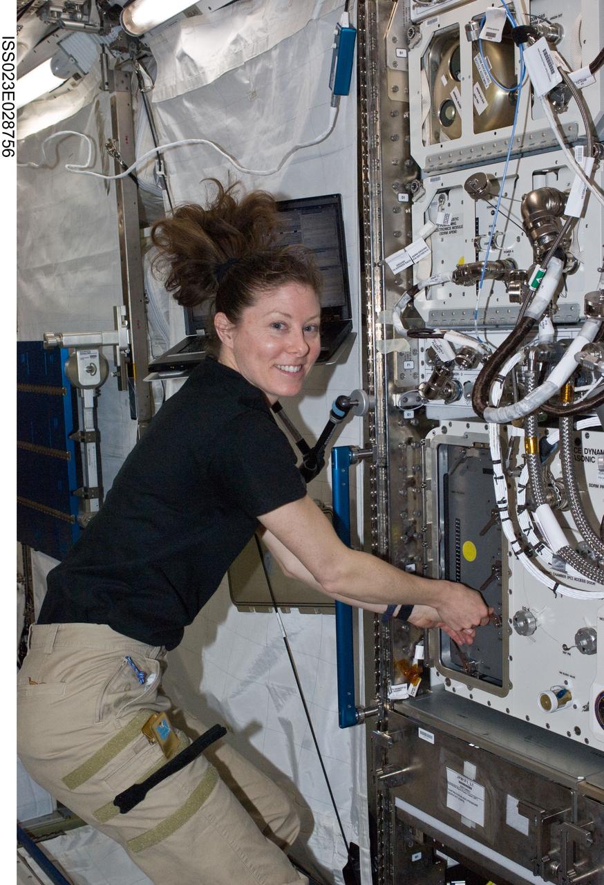 ISS023-E-028756 (28 April 2010) --- NASA astronaut Tracy Caldwell Dyson, Expedition 23 flight engineer, services the SpaceDRUMS/Space Dynamically Responding Ultrasonic Matrix (SDRM) hardware in the Kibo laboratory of the International Space Station.