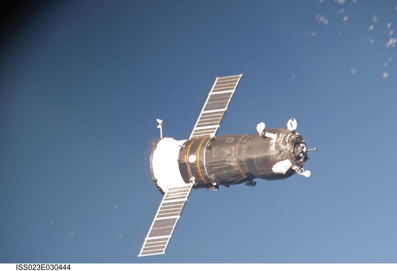 ISS023-E-030444 (1 May 2010) --- An unpiloted ISS Progress resupply vehicle approaches the International Space Station, bringing 2.6 tons of food, fuel, oxygen, propellant and supplies for the Expedition 23 crew members aboard the station. Progress 37 docked to the Pirs Docking Compartment at 2:30 p.m. (EDT) on May 1, 2010, after a three-day flight from the Baikonur Cosmodrome in Kazakhstan. The docking was conducted by Russian cosmonaut Oleg Kotov, commander, in manual control through the TORU (telerobotically operated) rendezvous system due to a jet failure on the Progress that forced a shutdown of the Kurs automated rendezvous system.