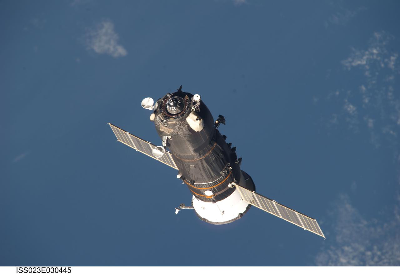ISS023-E-030445 (1 May 2010) --- An unpiloted ISS Progress resupply vehicle approaches the International Space Station, bringing 2.6 tons of food, fuel, oxygen, propellant and supplies for the Expedition 23 crew members aboard the station. Progress 37 docked to the Pirs Docking Compartment at 2:30 p.m. (EDT) on May 1, 2010, after a three-day flight from the Baikonur Cosmodrome in Kazakhstan. The docking was conducted by Russian cosmonaut Oleg Kotov, commander, in manual control through the TORU (telerobotically operated) rendezvous system due to a jet failure on the Progress that forced a shutdown of the Kurs automated rendezvous system.