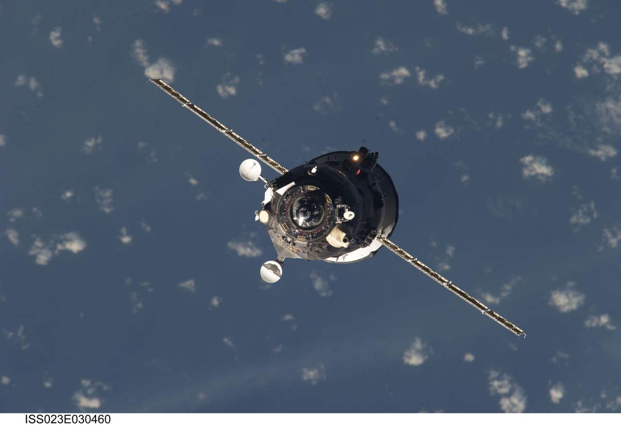 ISS023-E-030460 (1 May 2010) --- An unpiloted ISS Progress resupply vehicle approaches the International Space Station, bringing 2.6 tons of food, fuel, oxygen, propellant and supplies for the Expedition 23 crew members aboard the station. Progress 37 docked to the Pirs Docking Compartment at 2:30 p.m. (EDT) on May 1, 2010, after a three-day flight from the Baikonur Cosmodrome in Kazakhstan. The docking was conducted by Russian cosmonaut Oleg Kotov, commander, in manual control through the TORU (telerobotically operated) rendezvous system due to a jet failure on the Progress that forced a shutdown of the Kurs automated rendezvous system.