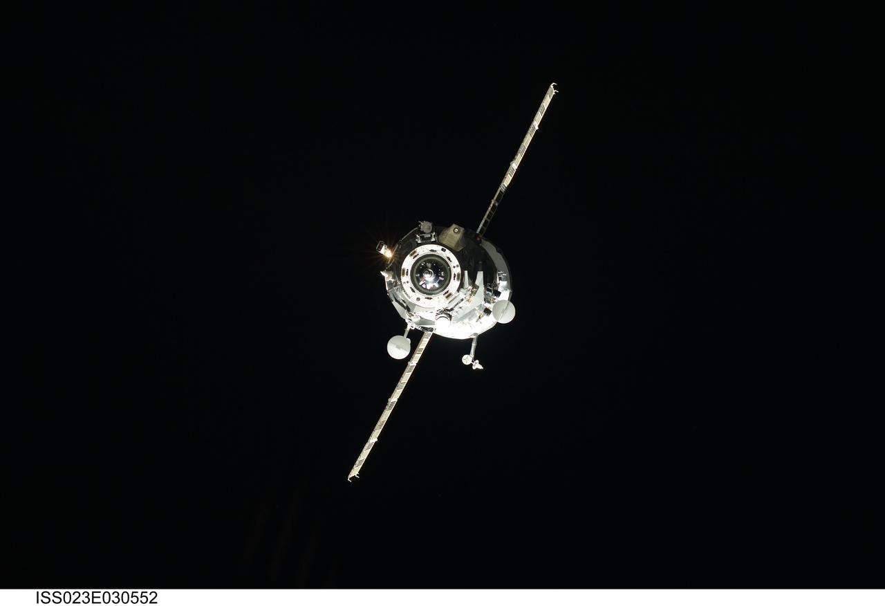 ISS023-E-030552 (1 May 2010) --- An unpiloted ISS Progress resupply vehicle approaches the International Space Station, bringing 2.6 tons of food, fuel, oxygen, propellant and supplies for the Expedition 23 crew members aboard the station. Progress 37 docked to the Pirs Docking Compartment at 2:30 p.m. (EDT) on May 1, 2010, after a three-day flight from the Baikonur Cosmodrome in Kazakhstan. The docking was conducted by Russian cosmonaut Oleg Kotov, commander, in manual control through the TORU (telerobotically operated) rendezvous system due to a jet failure on the Progress that forced a shutdown of the Kurs automated rendezvous system.