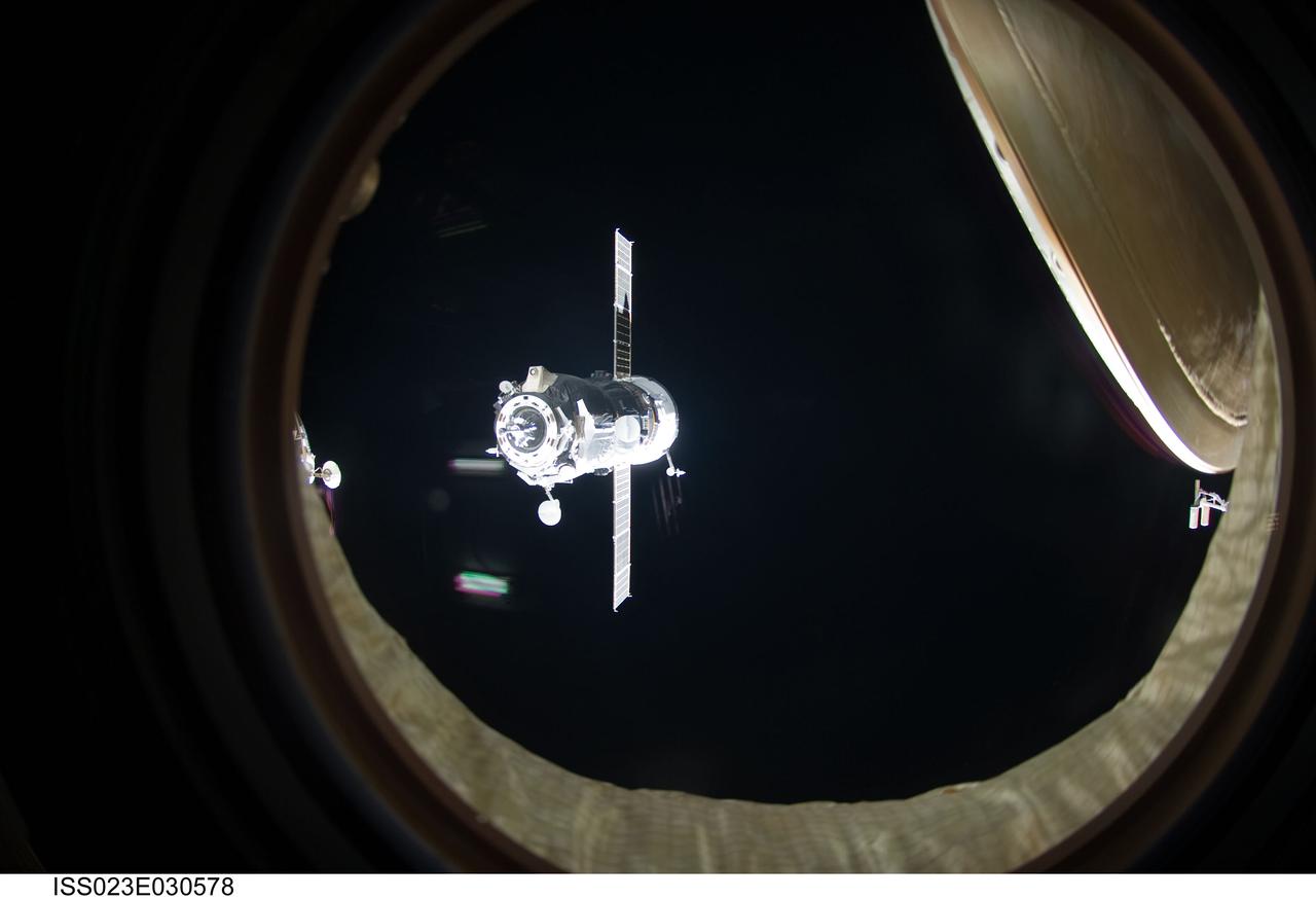 ISS023-E-030578 (1 May 2010) --- An unpiloted ISS Progress resupply vehicle approaches the International Space Station, bringing 2.6 tons of food, fuel, oxygen, propellant and supplies for the Expedition 23 crew members aboard the station. Progress 37 docked to the Pirs Docking Compartment at 2:30 p.m. (EDT) on May 1, 2010, after a three-day flight from the Baikonur Cosmodrome in Kazakhstan. The docking was conducted by Russian cosmonaut Oleg Kotov, commander, in manual control through the TORU (telerobotically operated) rendezvous system due to a jet failure on the Progress that forced a shutdown of the Kurs automated rendezvous system.